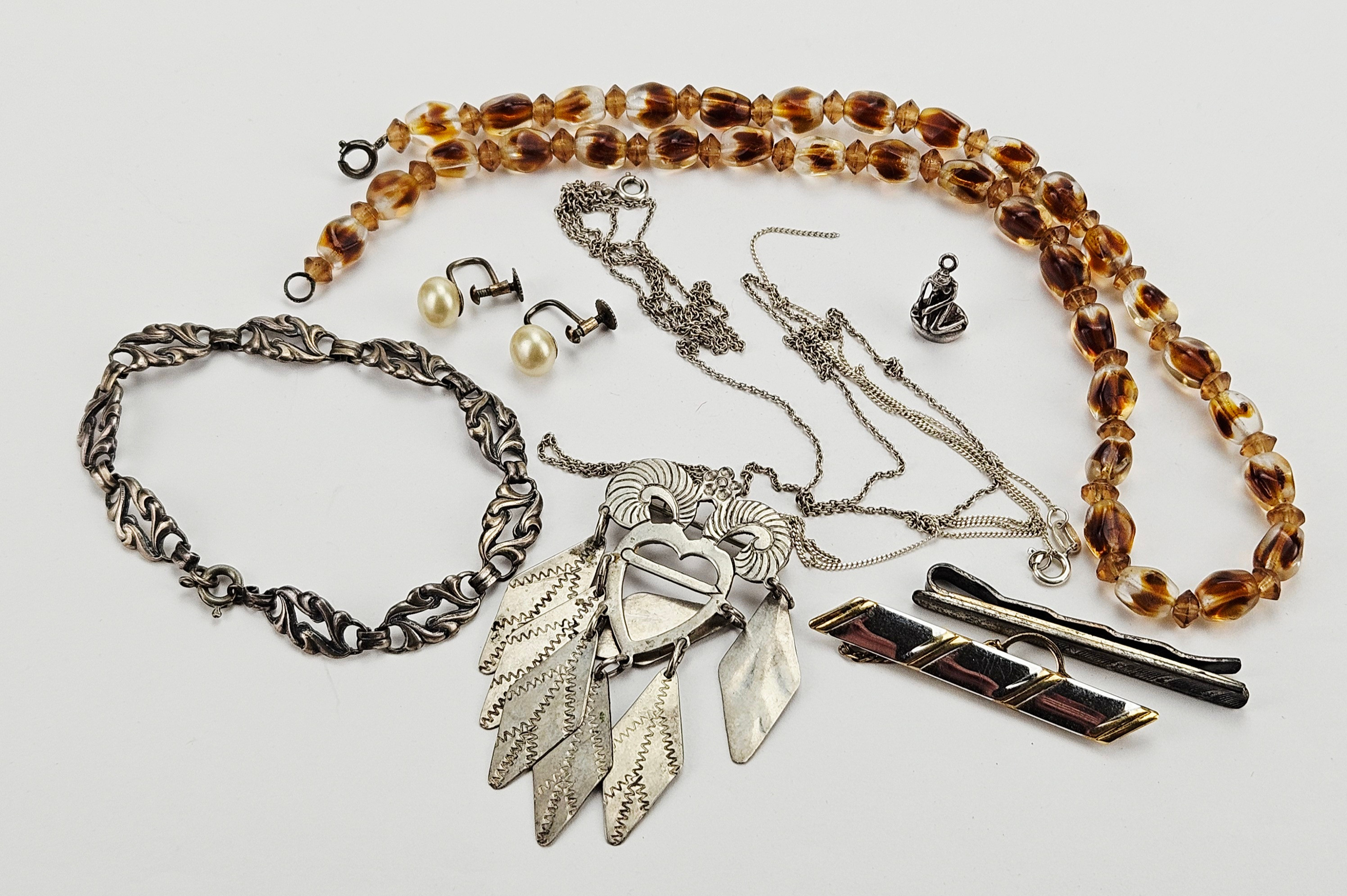 SMYCKEN, 8 delar, silver, COLLIER, plast/bakelit, 1900-tal.