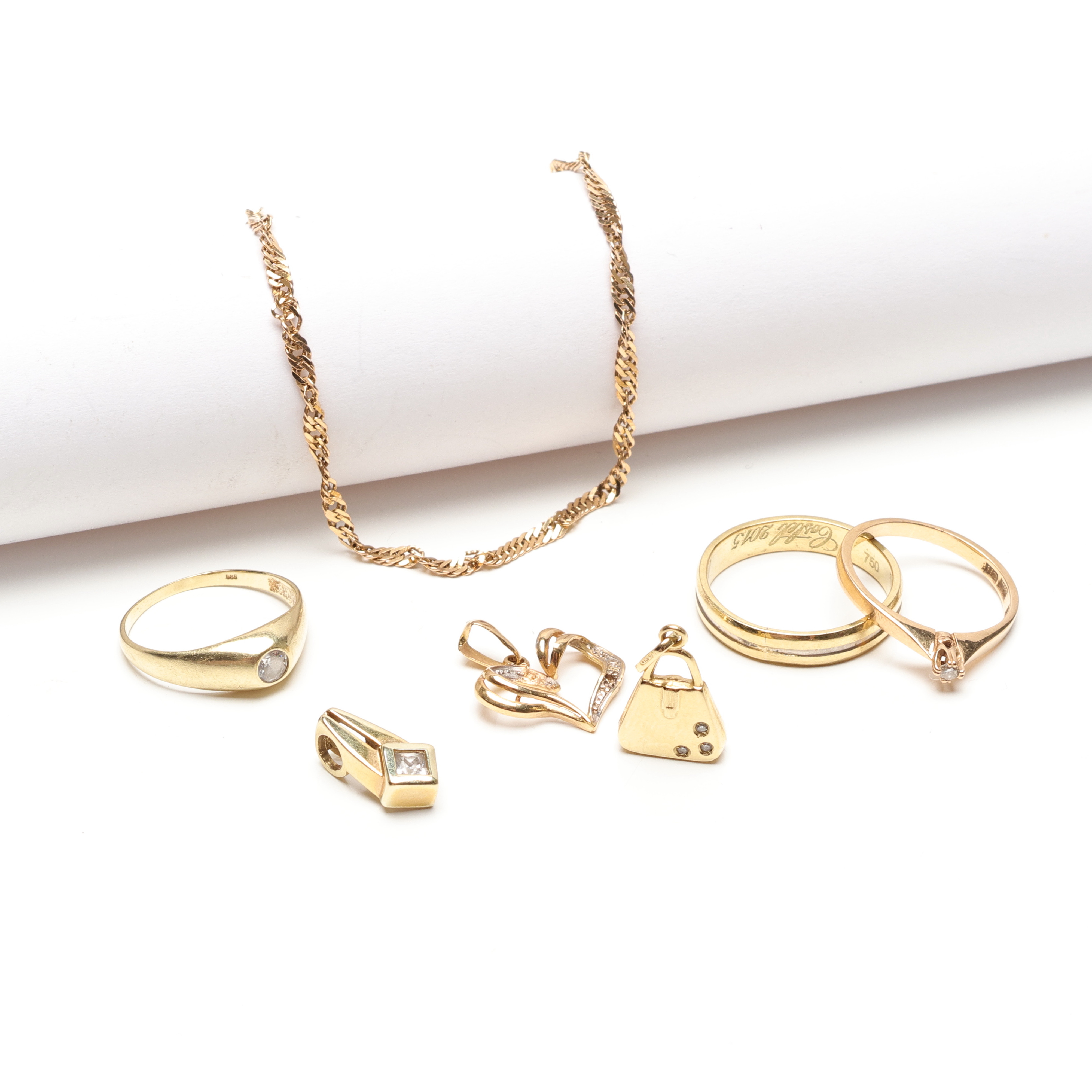 SMYCKEN, guld, sju delar, 18k, ca 12,8 gram.