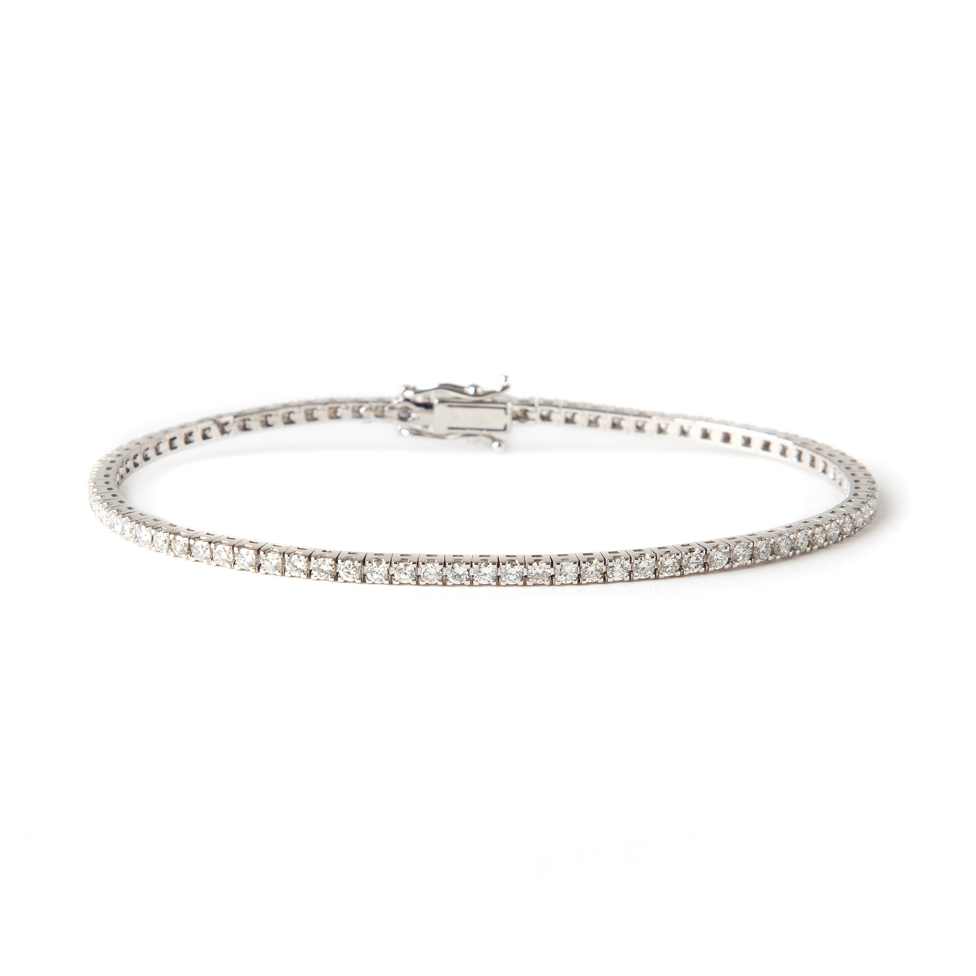 ARMBAND, "tennisarmband", 18K vitguld med briljantslipade diamanter, totalt ca 3.50 ct.