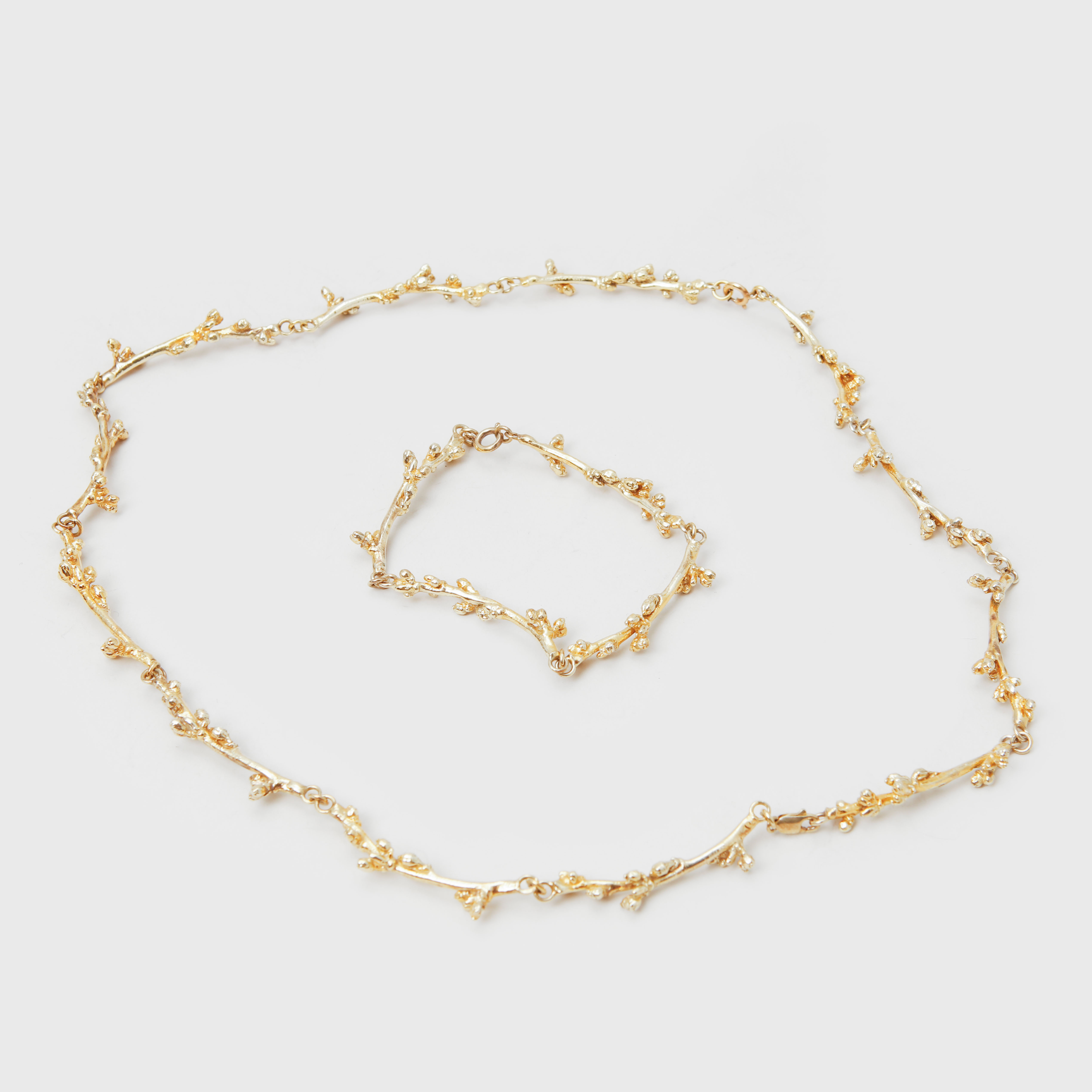 COLLIER samt ARMBAND, förgyllt silver. Vikt 70 gram.