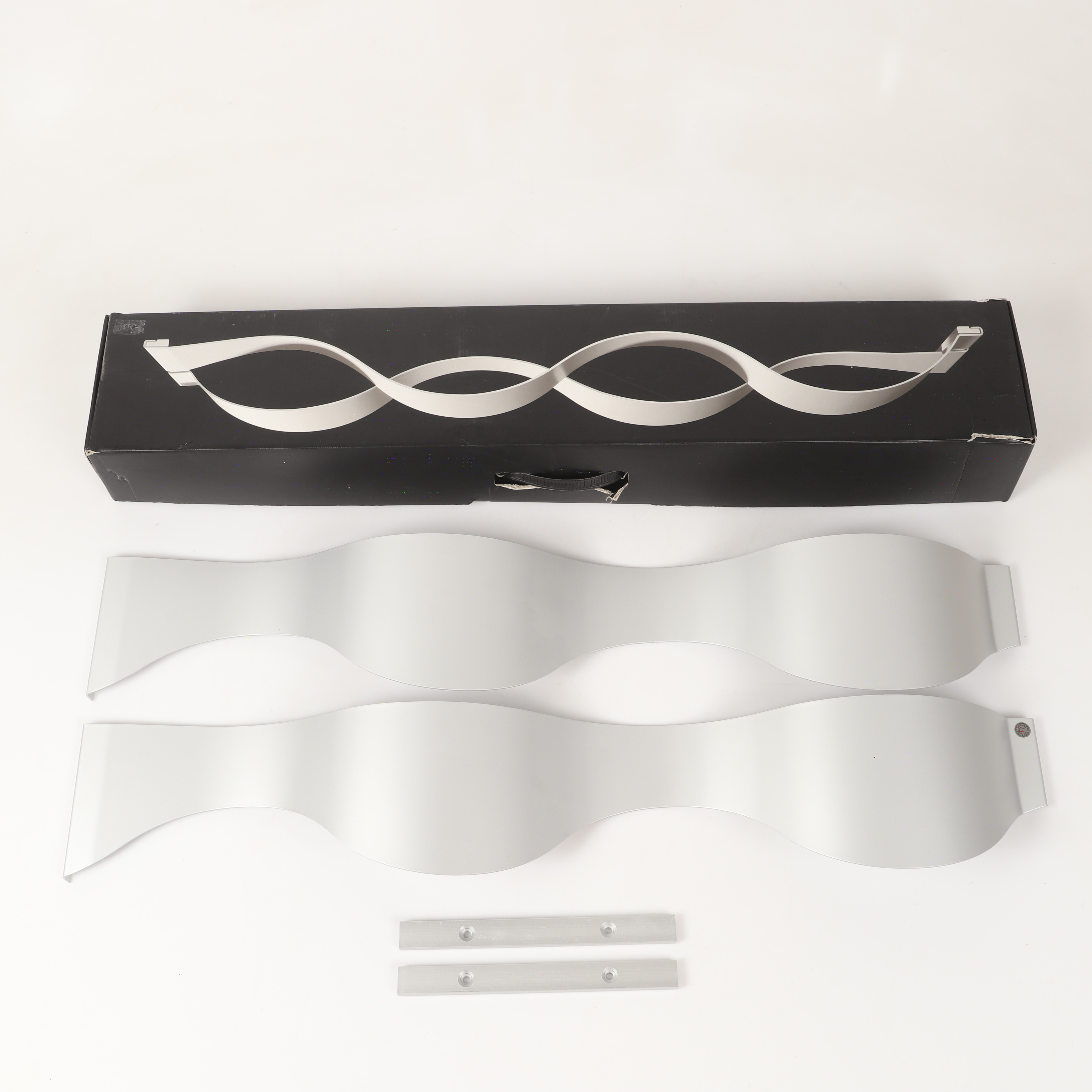 MARIA BERNTSEN. Tidningshylla, "Wallpaper", aluminium, Rosendahl, Danmark.