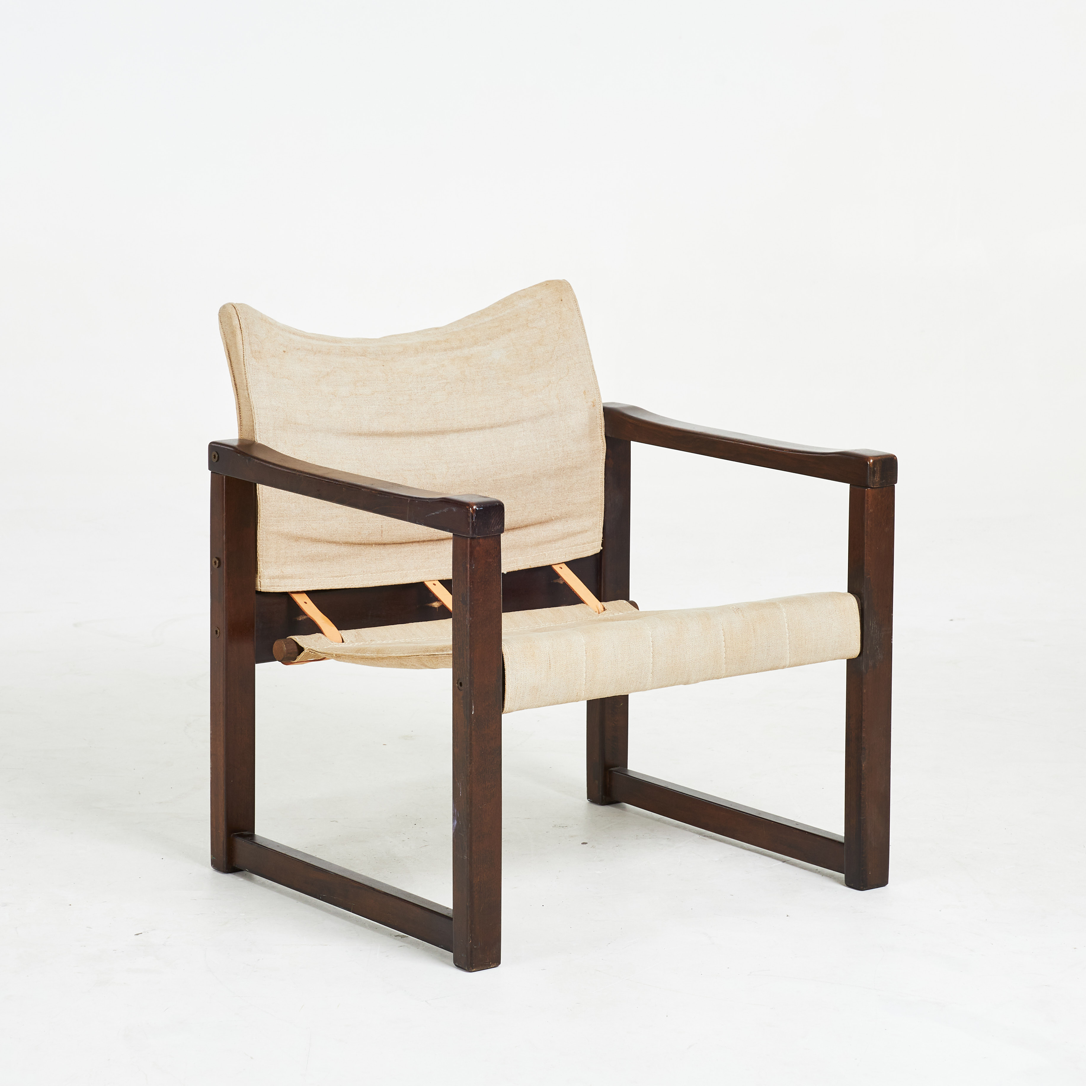KARIN MOBRING. fåtölj, "Diana", för IKEA, stomme av mörkbetsad furu, sits och rygg av canvastyg, spännen i läder, modellen formgiven 1971.