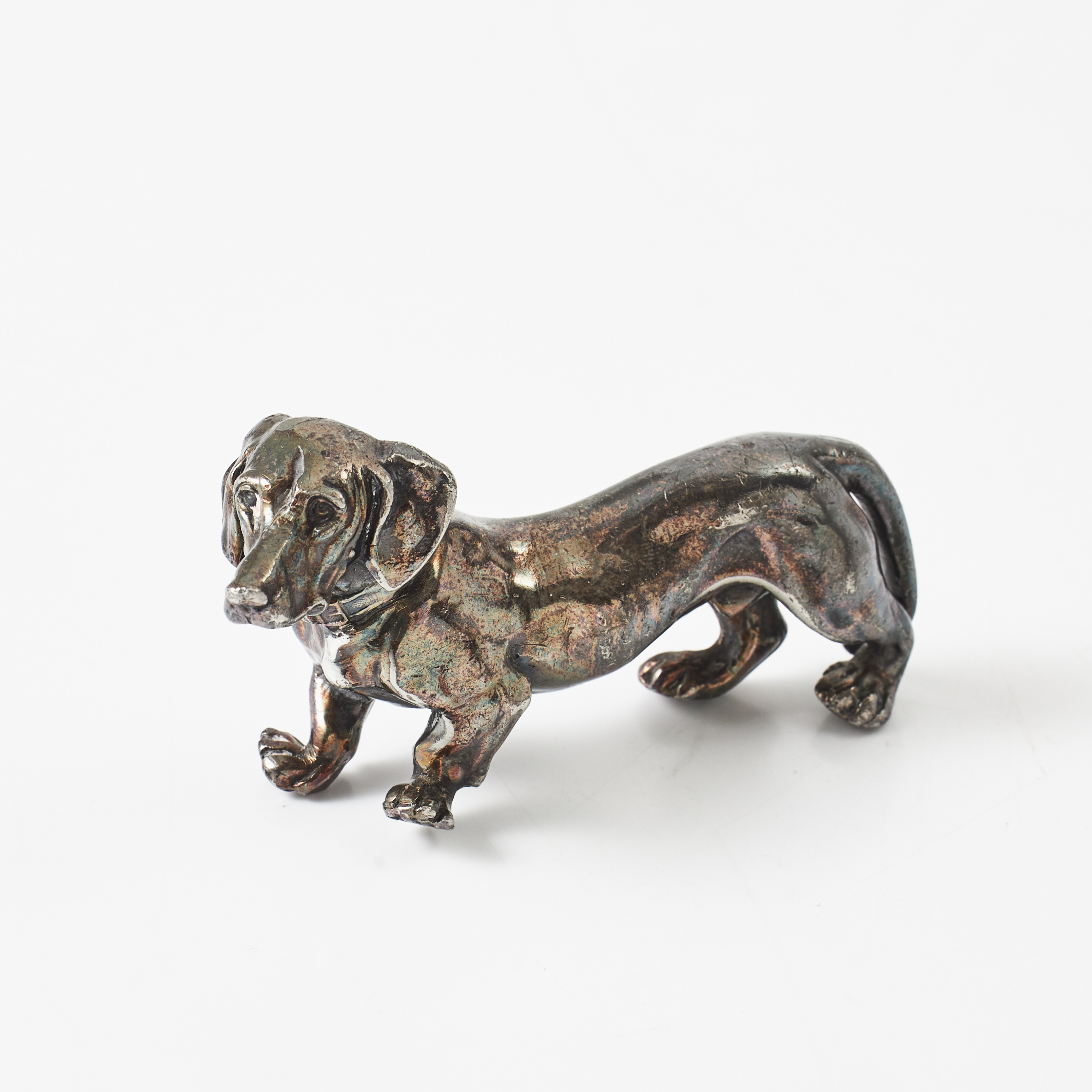 FIGUR, i form av tax, omkring 1900, silverpläterad.