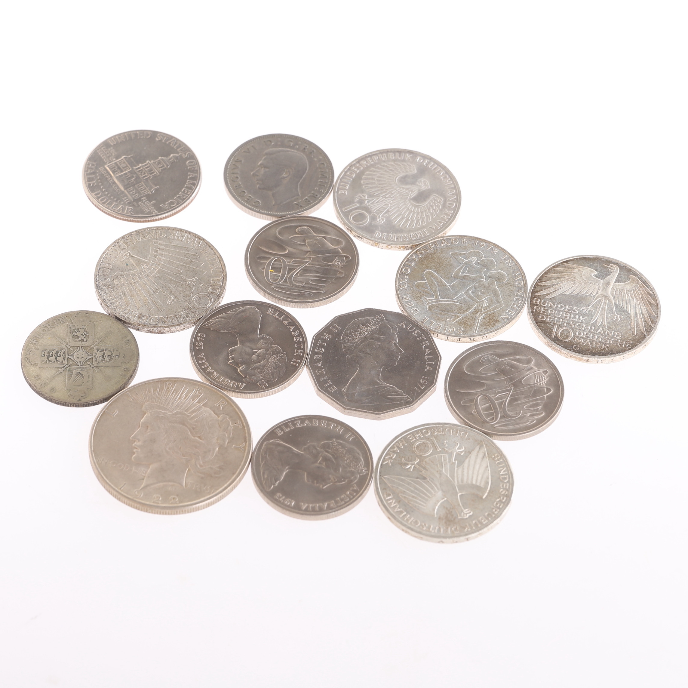 DIVERSE MYNT, 14 st, bland annat one dollar 1922.