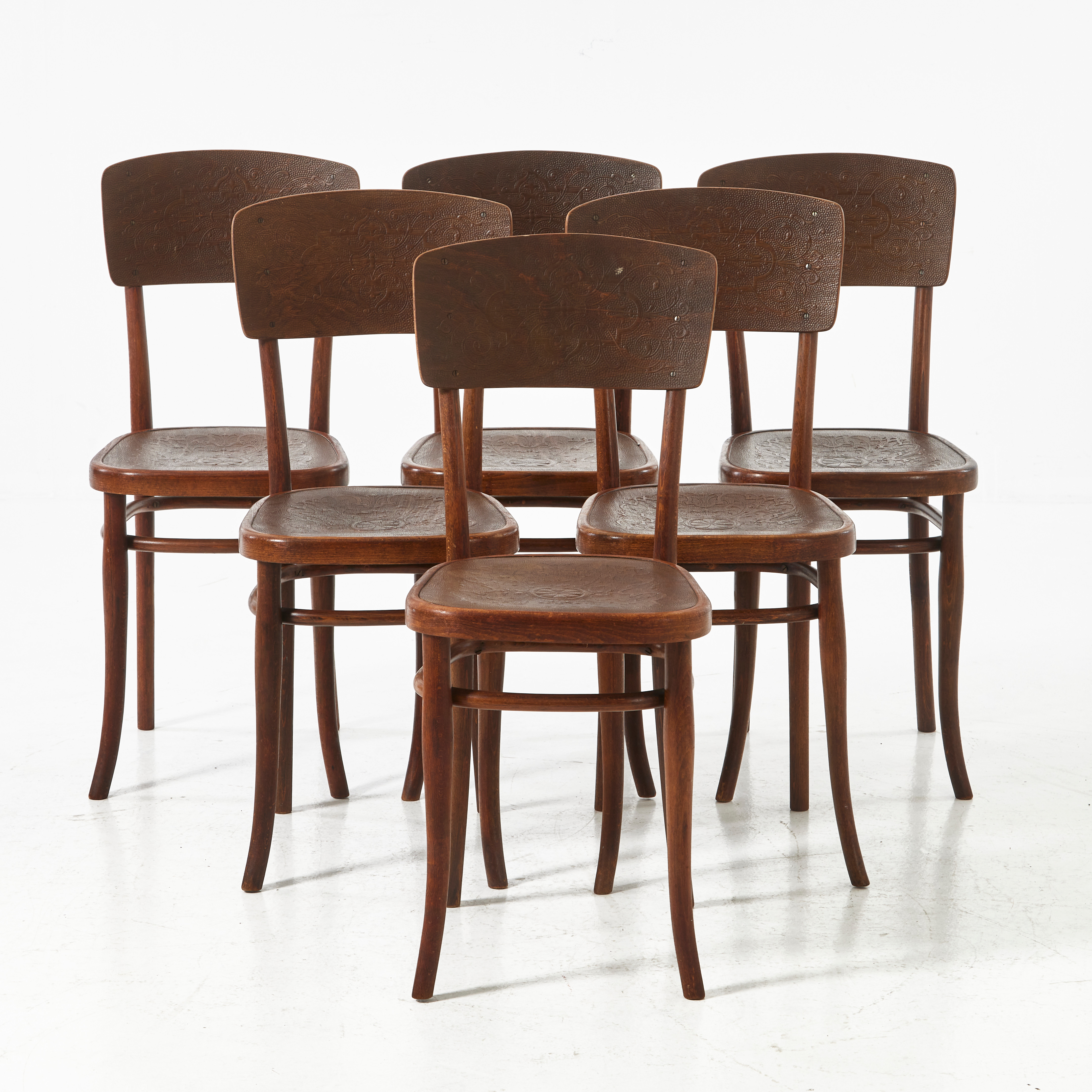 THONET, caféstolar, 6 st., modell 57, betsad bok, präglade sitsar samt på ryggbricka med riklig dekor av bladslingor, Wien omkring 1900.
