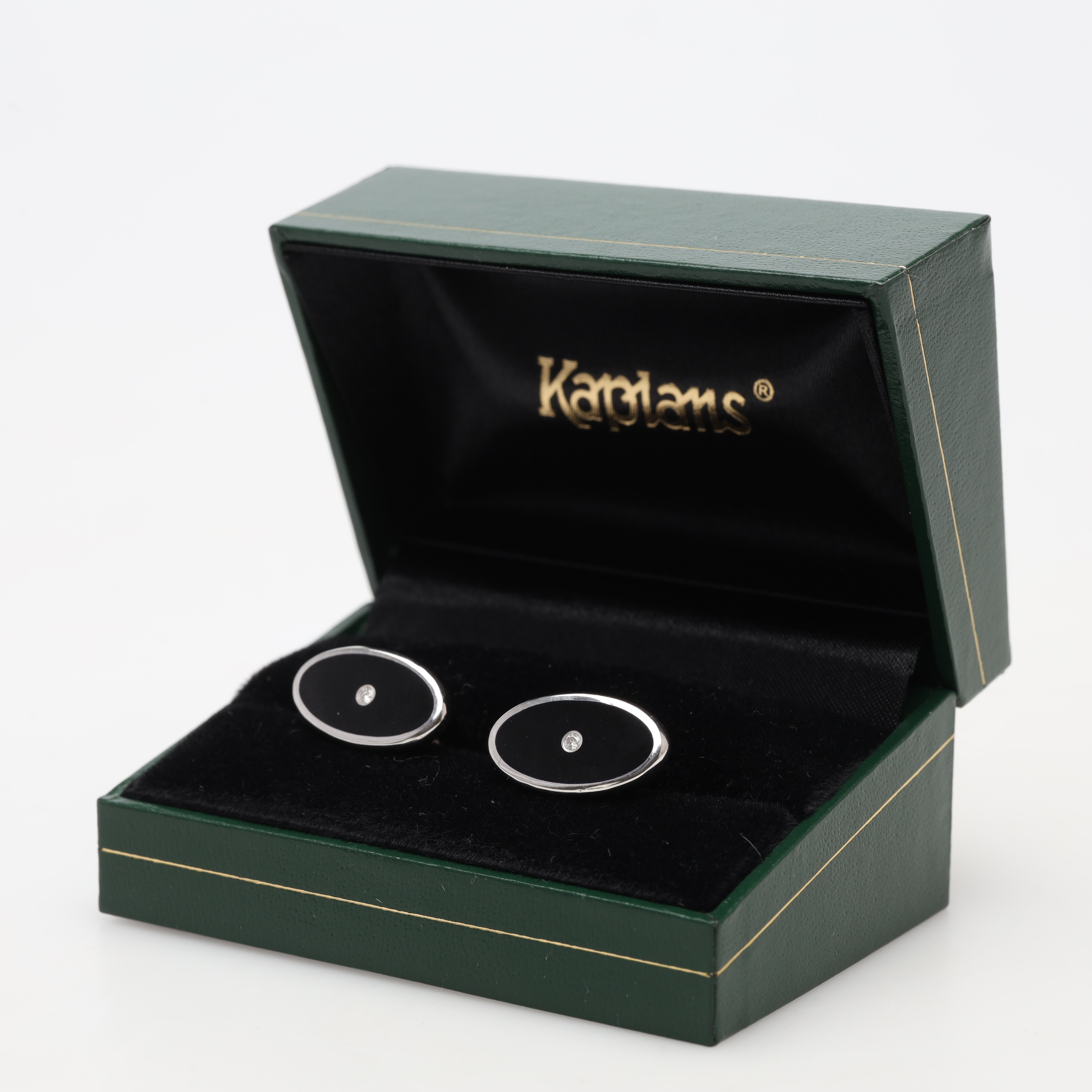 MANSCHETTKNAPPAR, ett par, sterlingsilver, emalj, diamant, bruttovikt ca 9,7 gram.