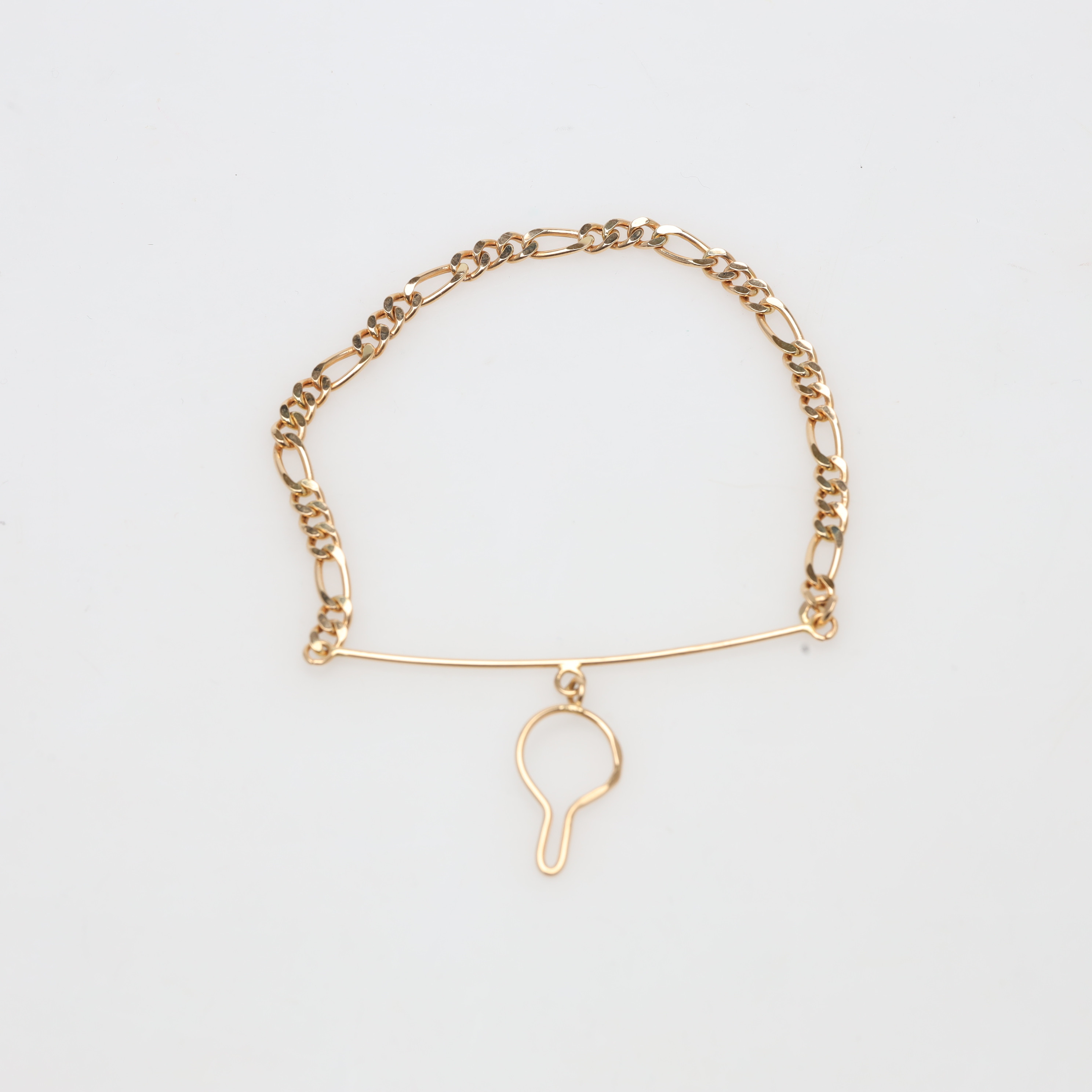 SLIPSSMYCKE 18K, guld, vikt ca 3,7 gram.