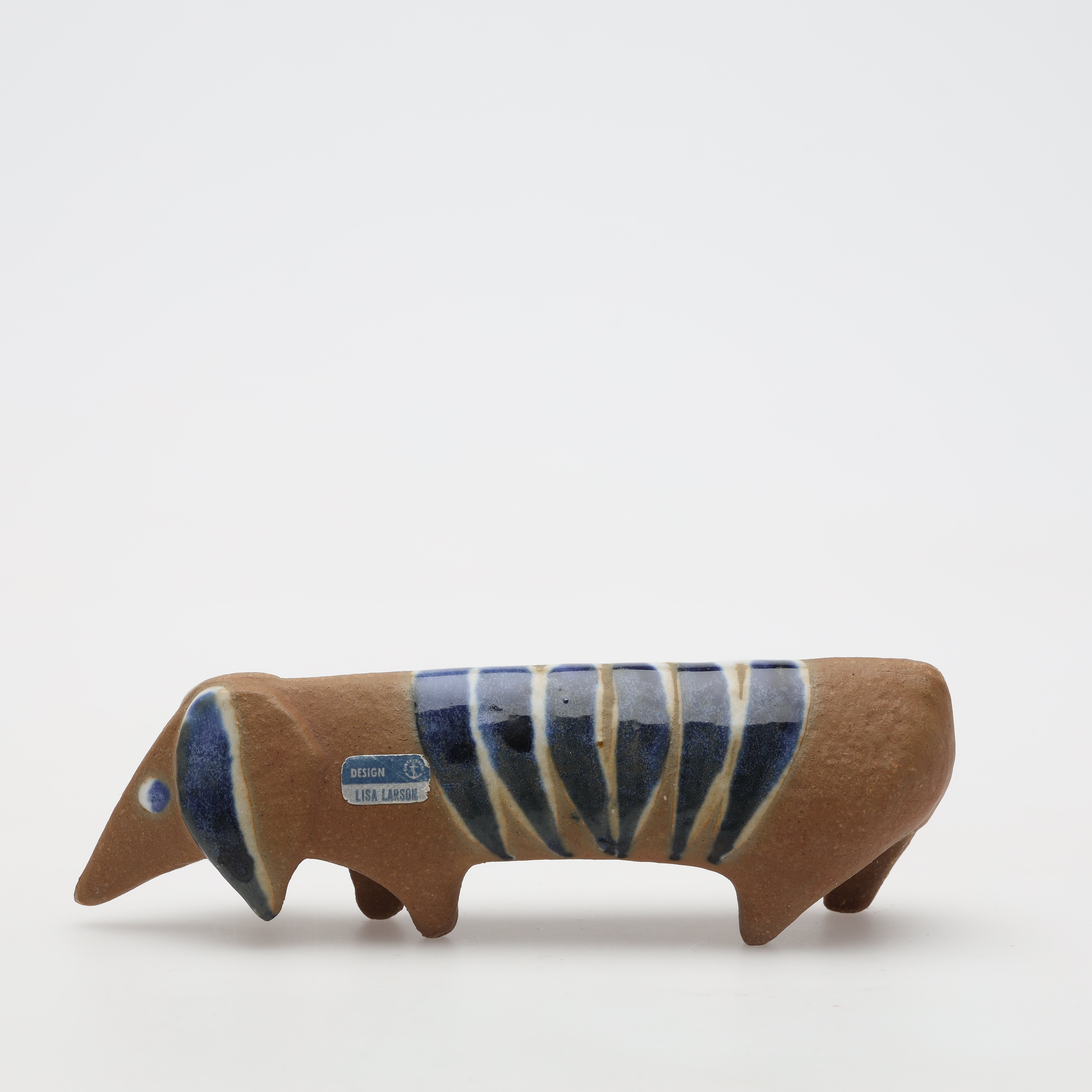 LISA LARSON. FIGURIN, stengods "tax" Gustavsberg.
