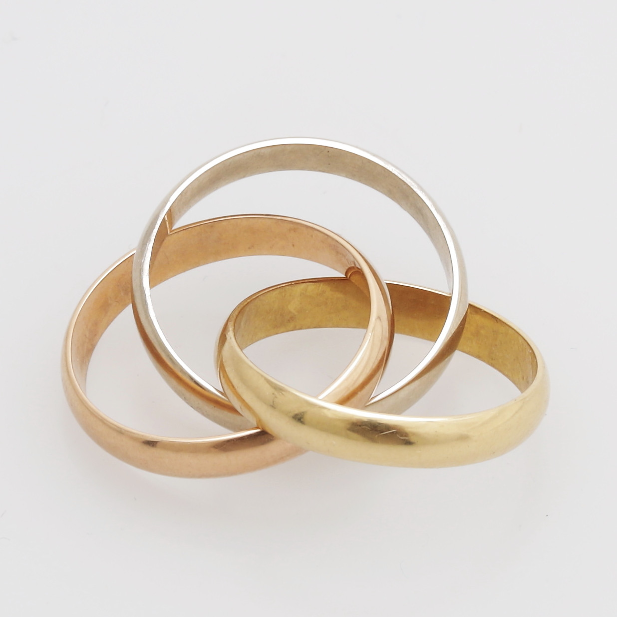 RING, tre st i en, guld 18K, Cartier Trinity, totalvikt 8,26 gram.