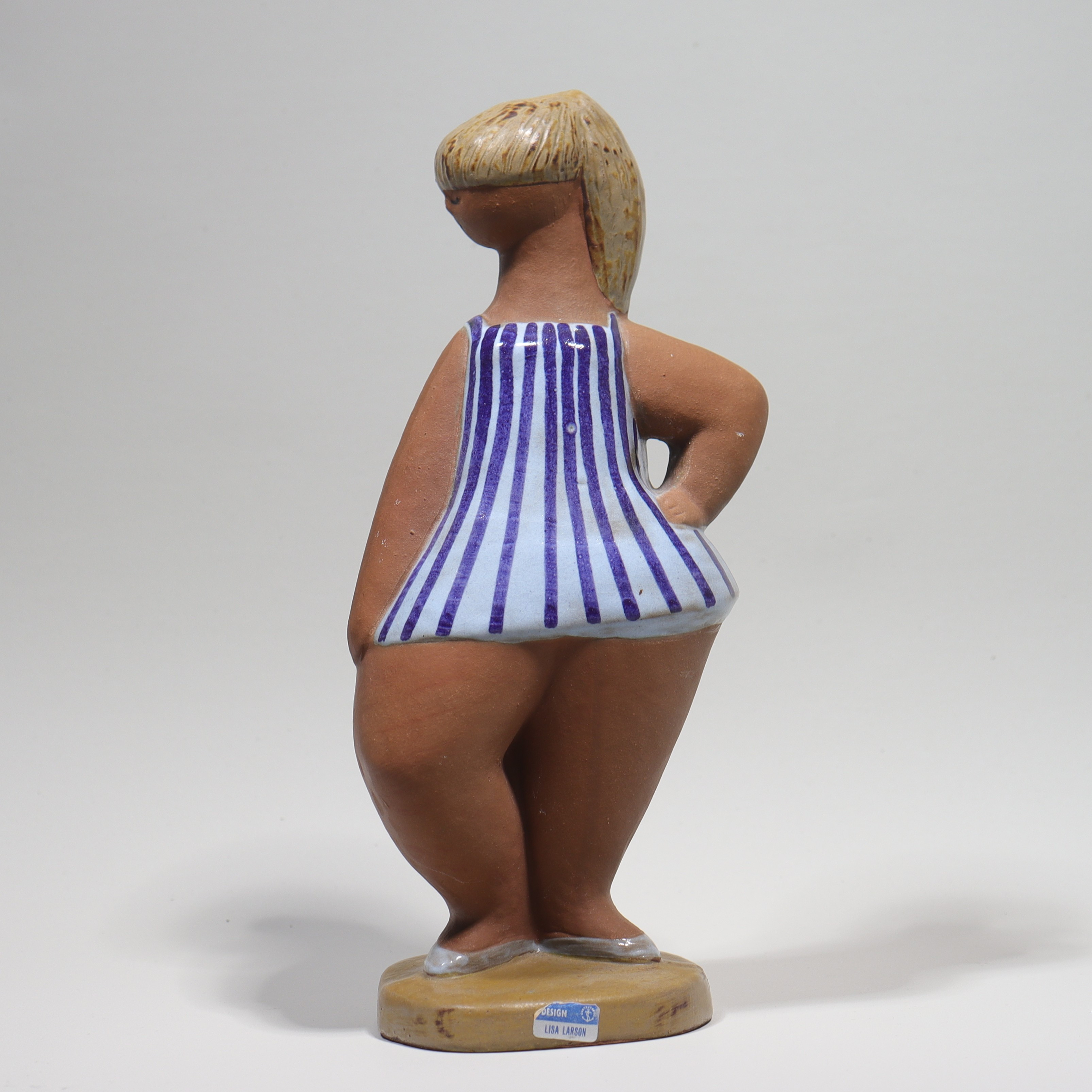 LISA LARSON. "Dora", ur serien "ABC-flickorna", figurin i stengods, Gustavsberg.