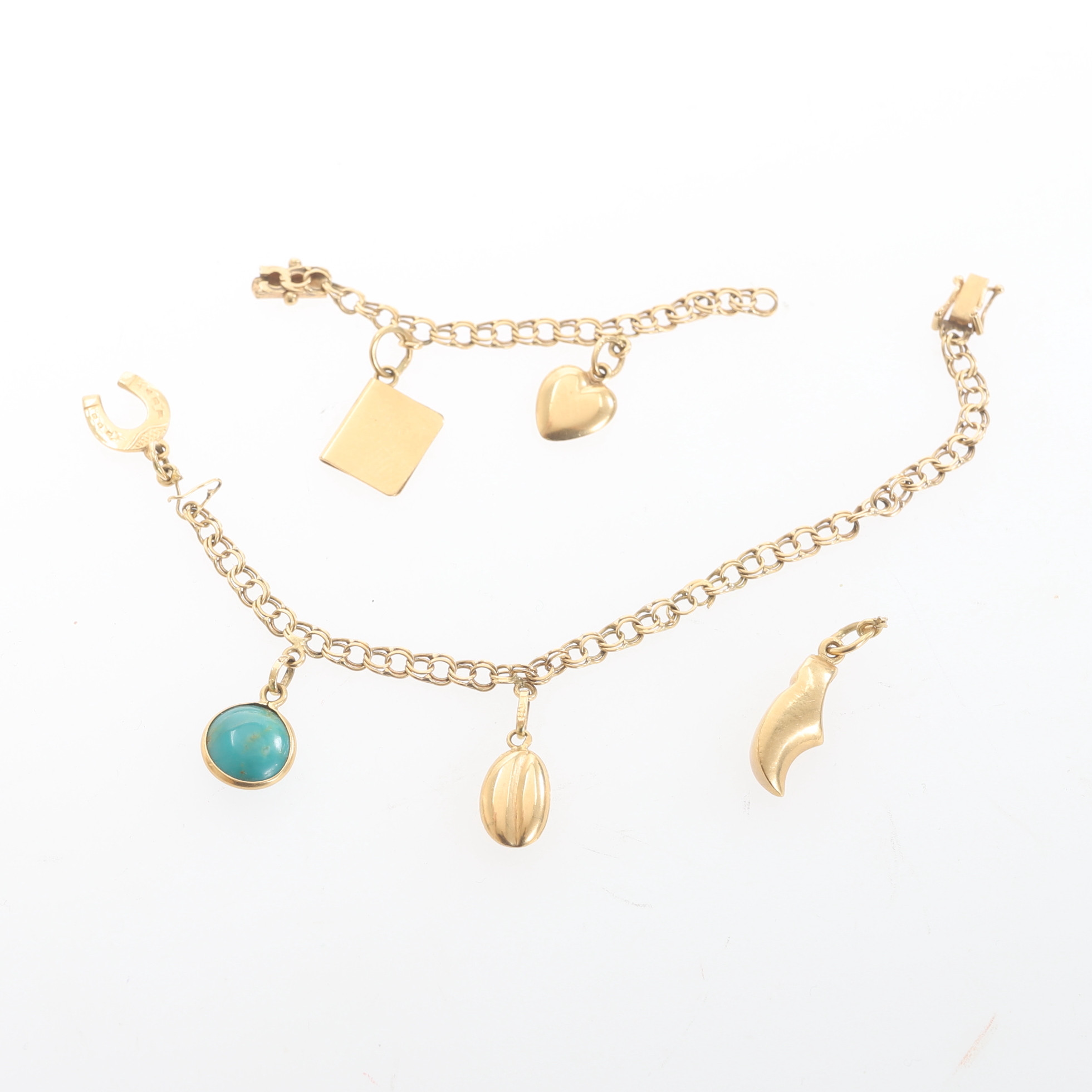 ARMBAND, med berlocker, 18 k guld.