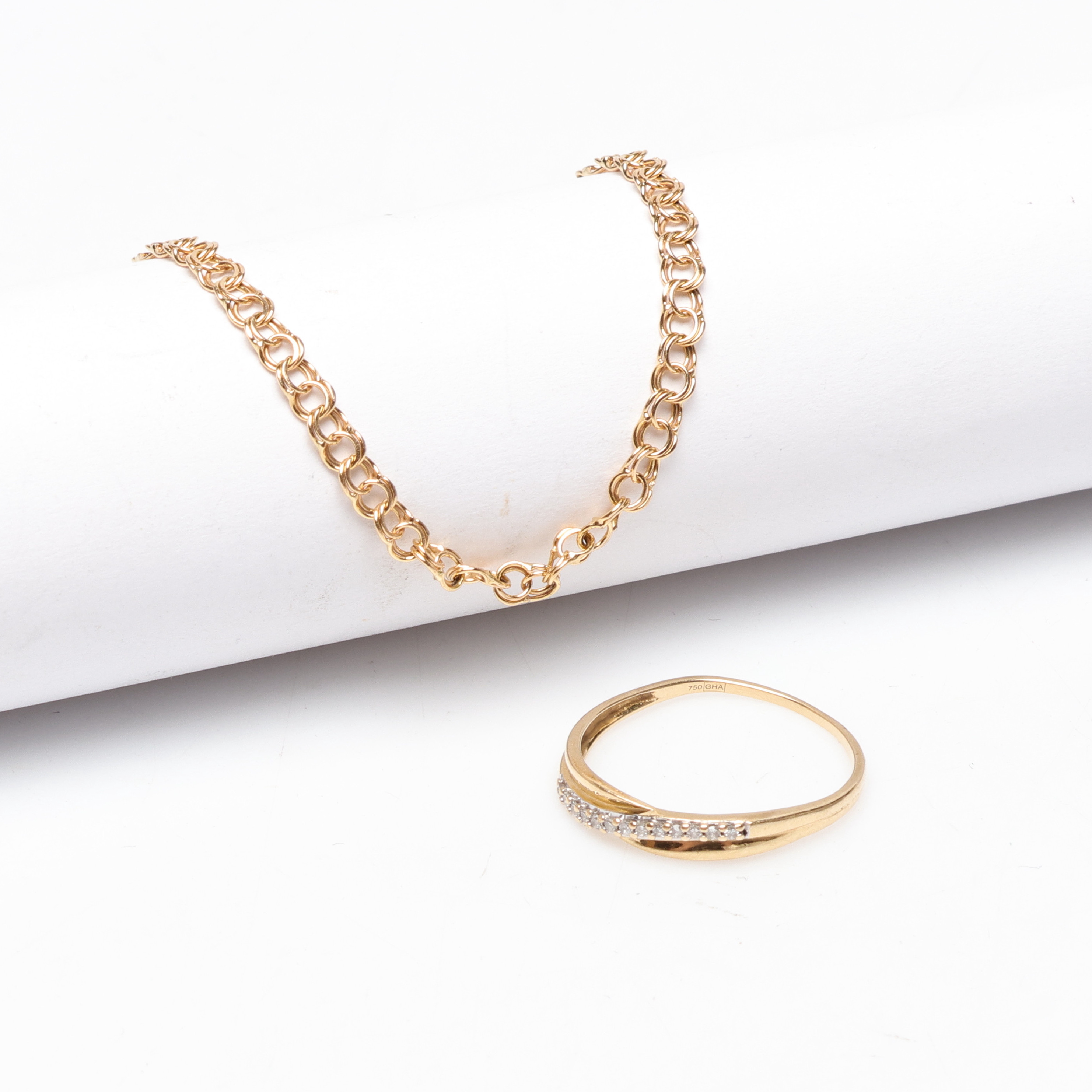ARMBAND samt RING, 18K, Guld, vikt cirka 3,5 gram.