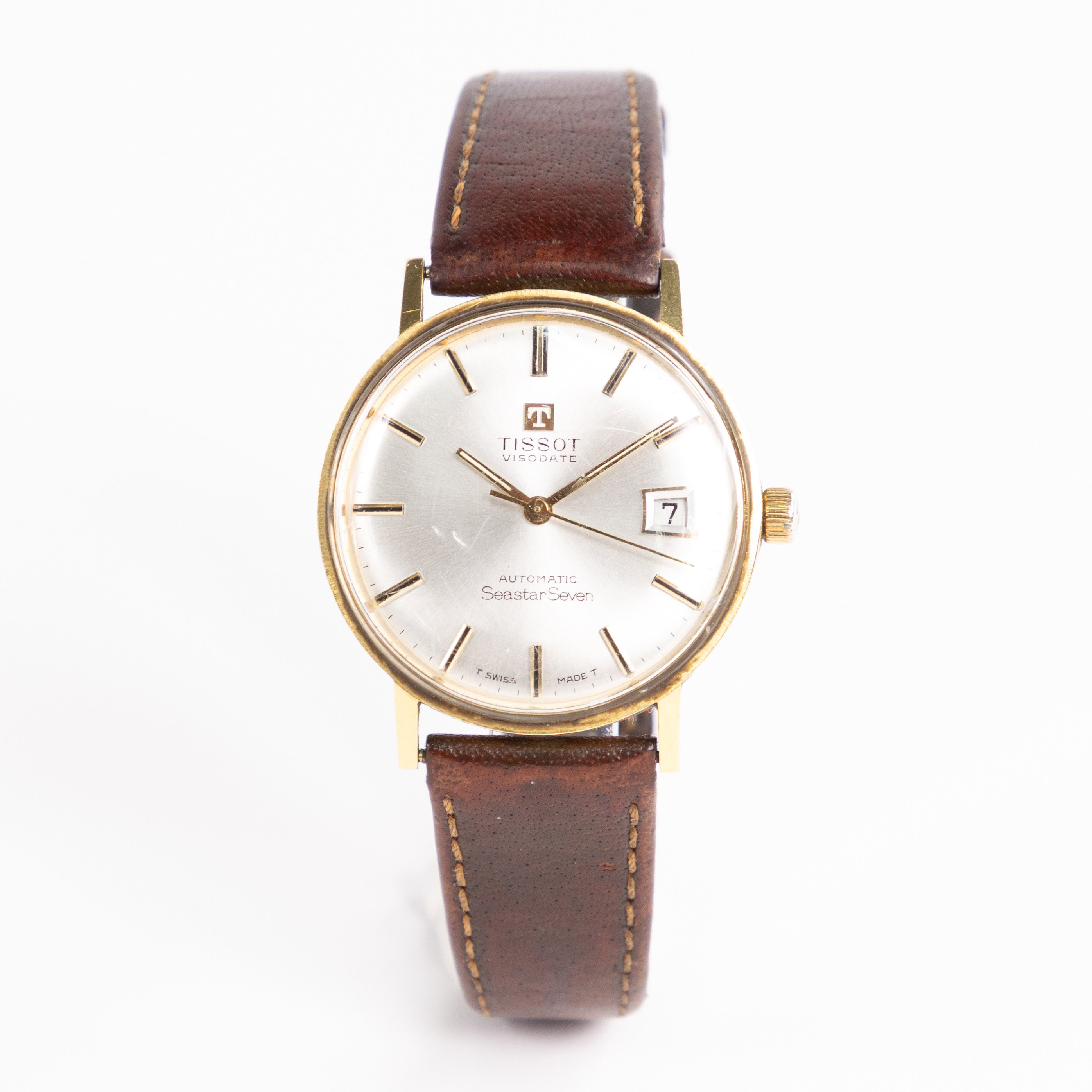 TISSOT. Seastar Seven Automatic, 34 mm, 18k guld.
