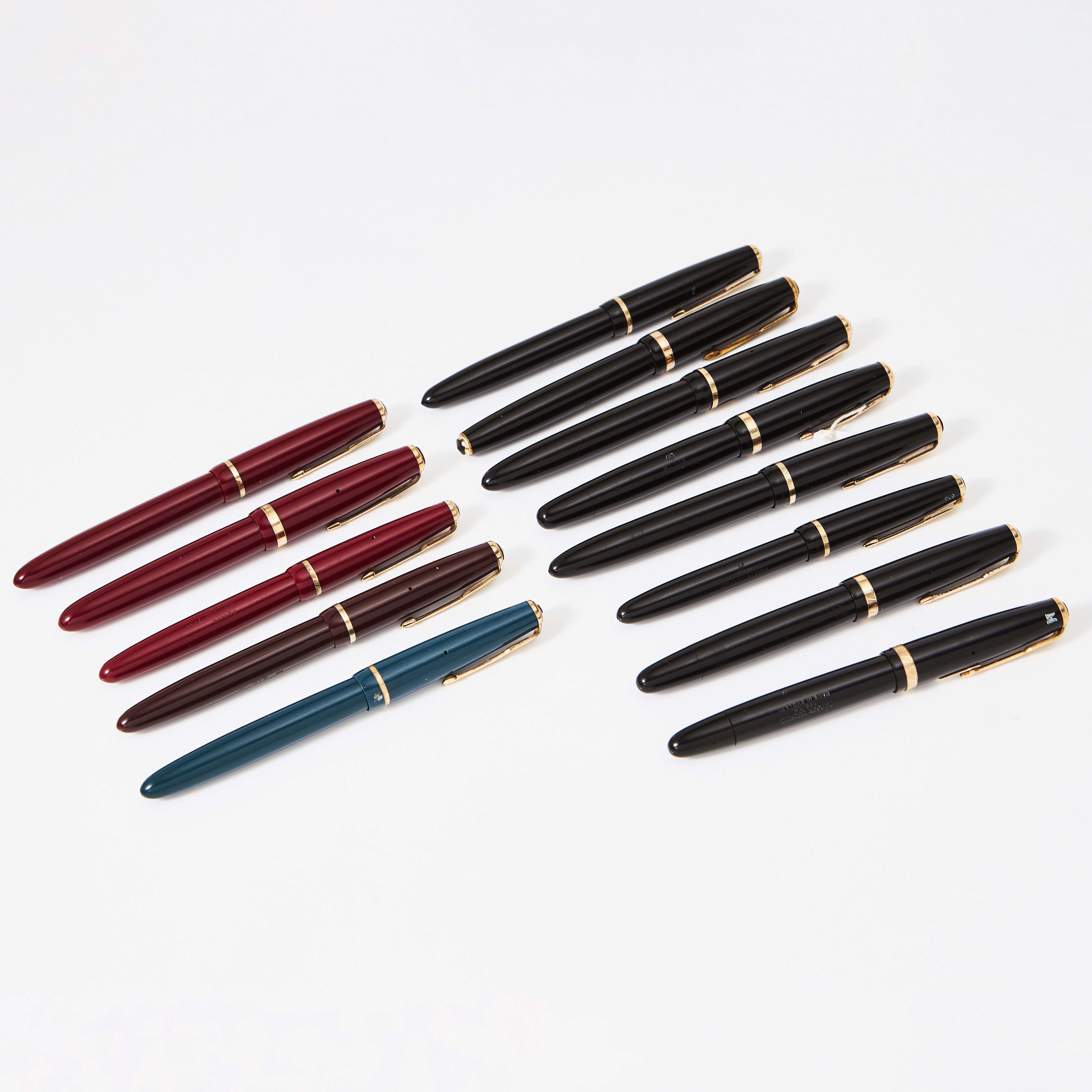 PARKER, 13 st, resorvarpennor, "Duofold", "Victory", "Slimfold" stift i 14k guld. 1900-tal.