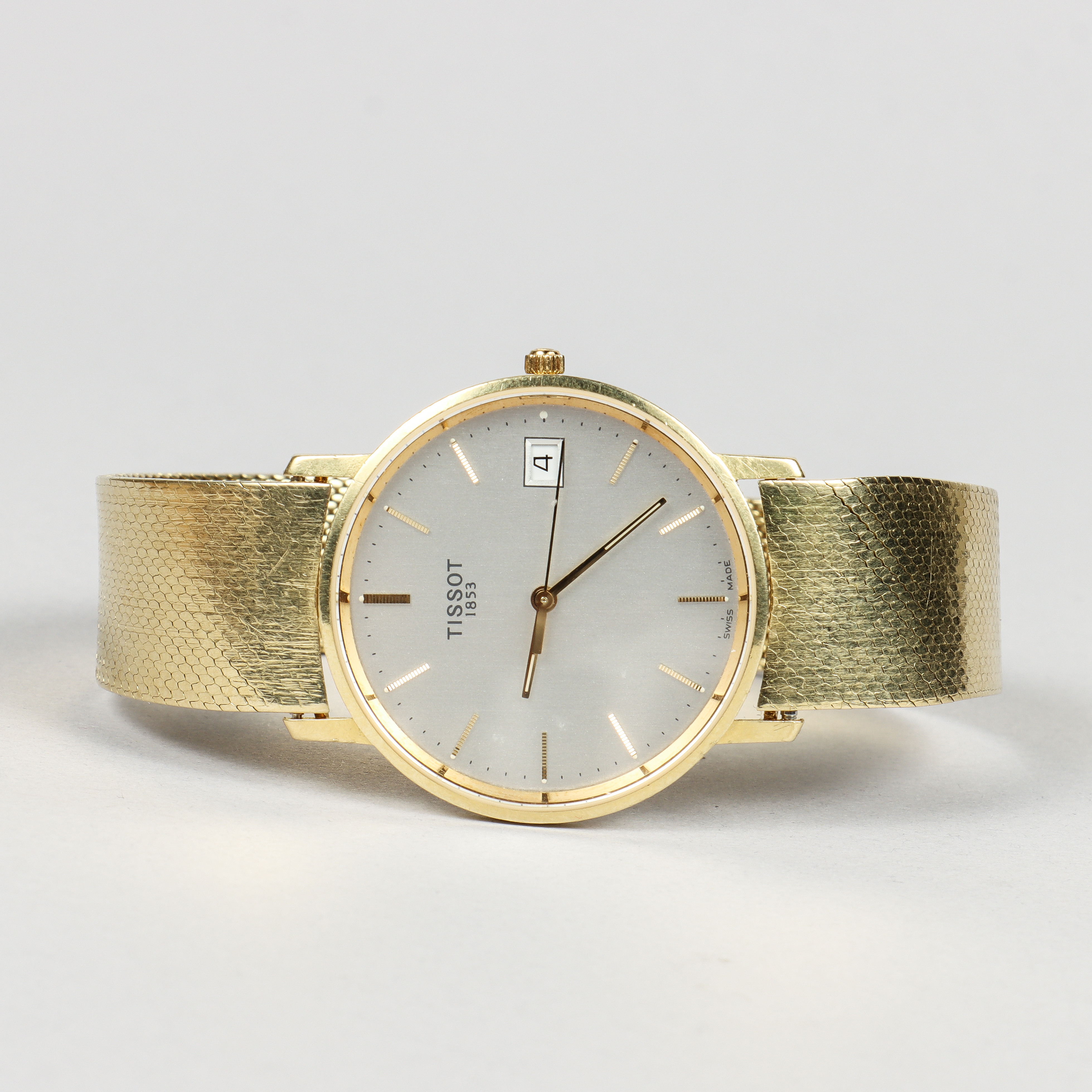 GULDKLOCKA, Tissot, boett och armband (IWC) i 18k guld, quartz.