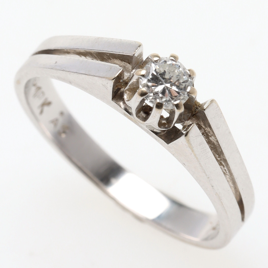 RING, 18K vitguld med 0,25 ct briljant.