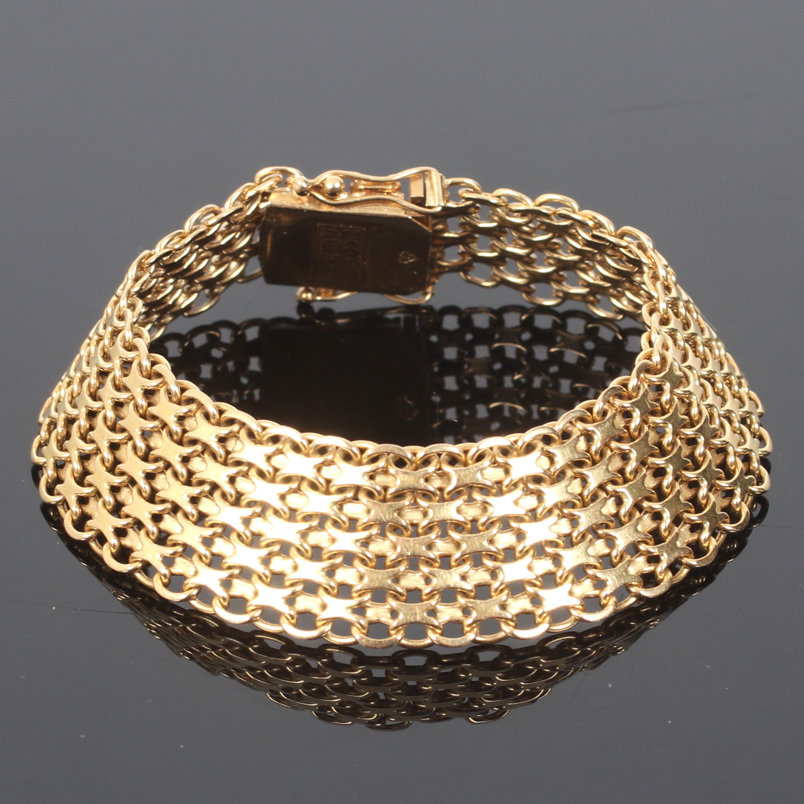 ARMBAND, 18k guld, treradig x-länk, Nyckel-Guld Leif Johansson Firma, Köping. 1963.