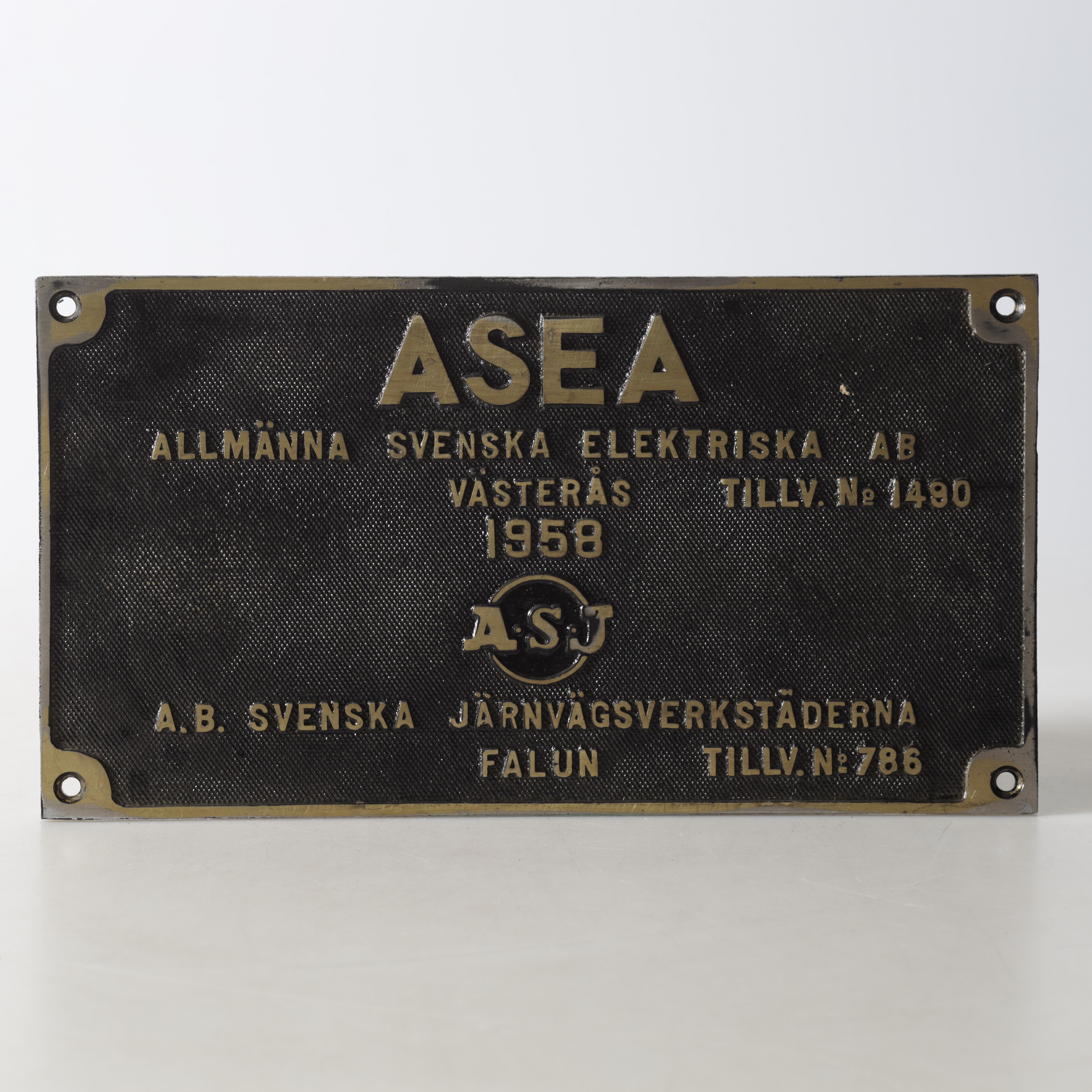 SKYLT, metall, ASEA, Svenska Järnvägsverkstäderna, 1958.