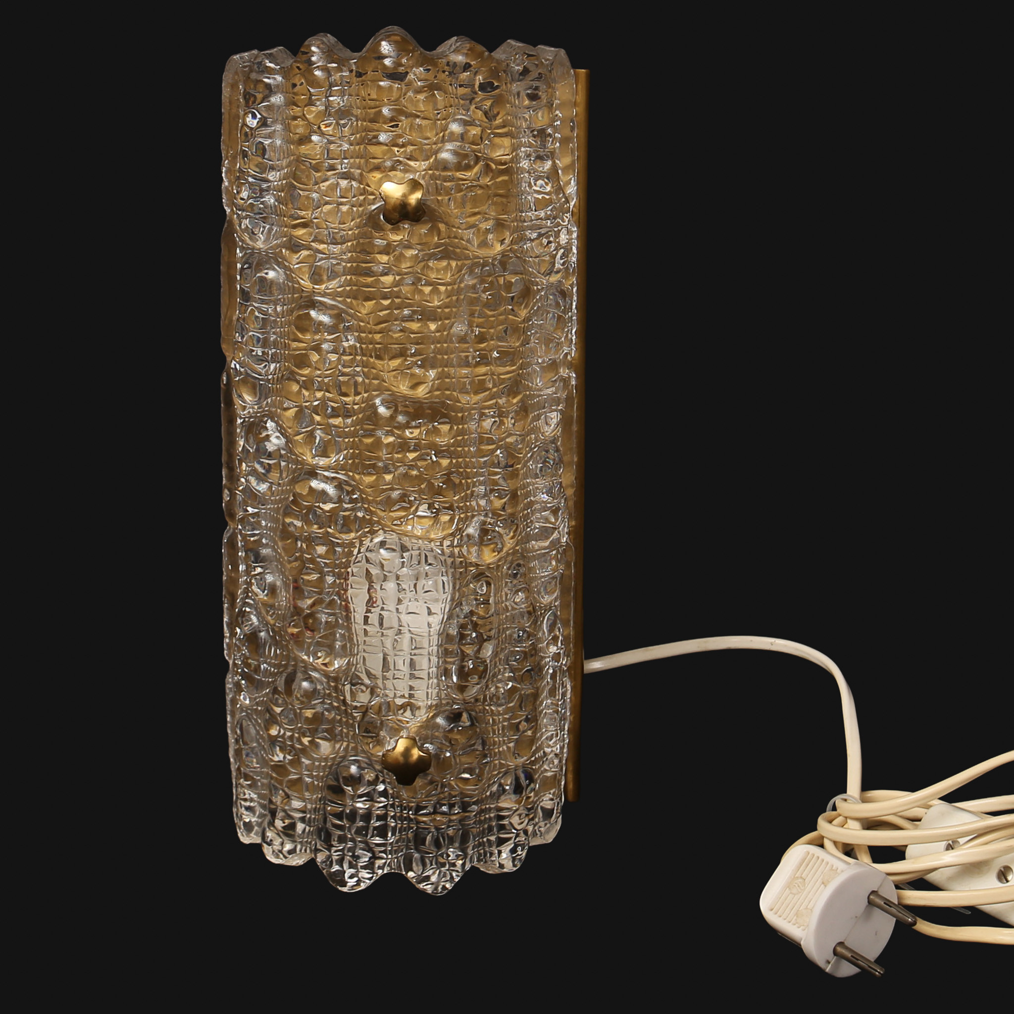 CARL FAGERLUND. Vägglampa, glas och mässing , Orrefors.