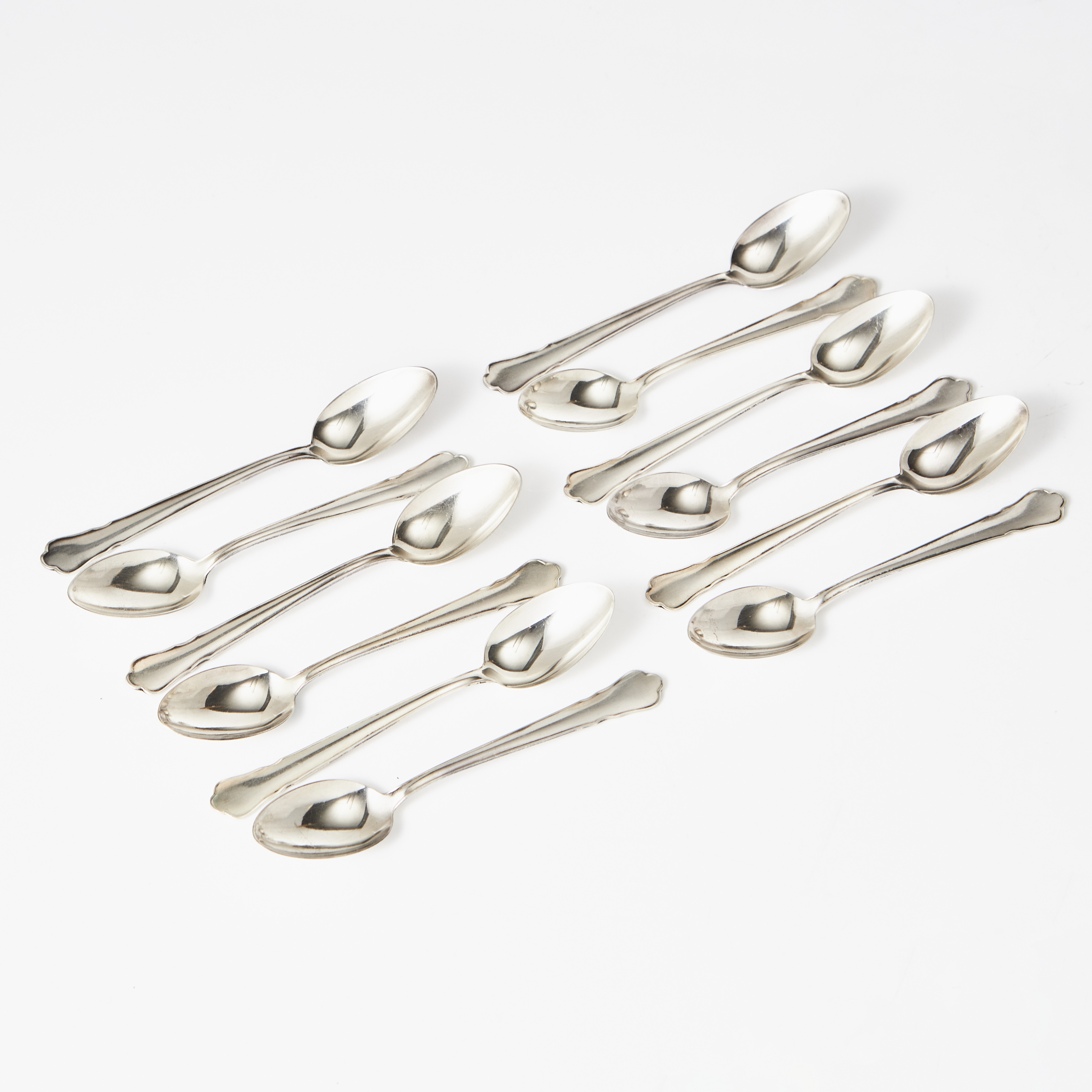 KAFFESKEDAR, 12 stycken, silver, modell "Chippendale", GAB (Guldsmedsaktiebolaget).