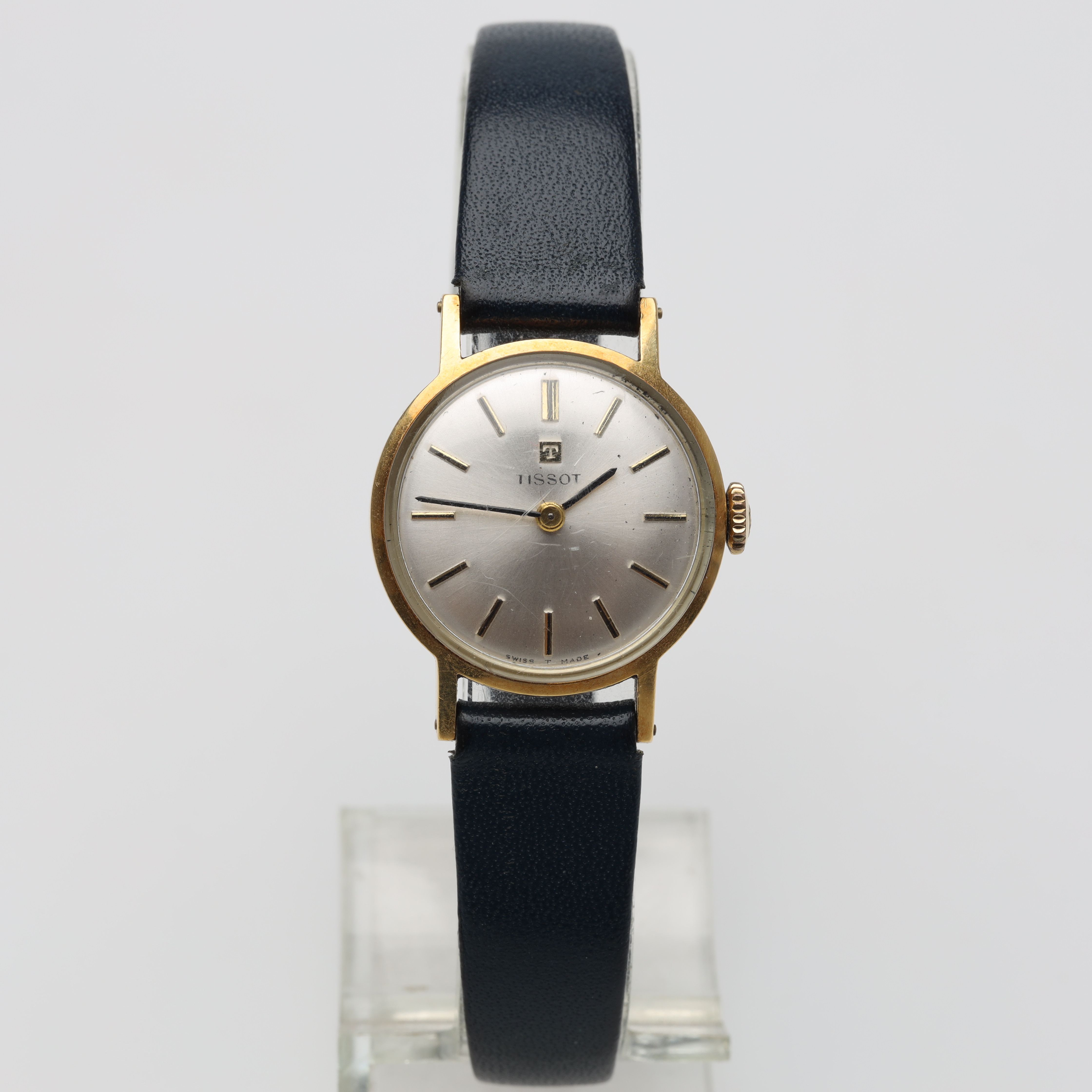 DAMUR Tissot manuell 18K guld med läderband.