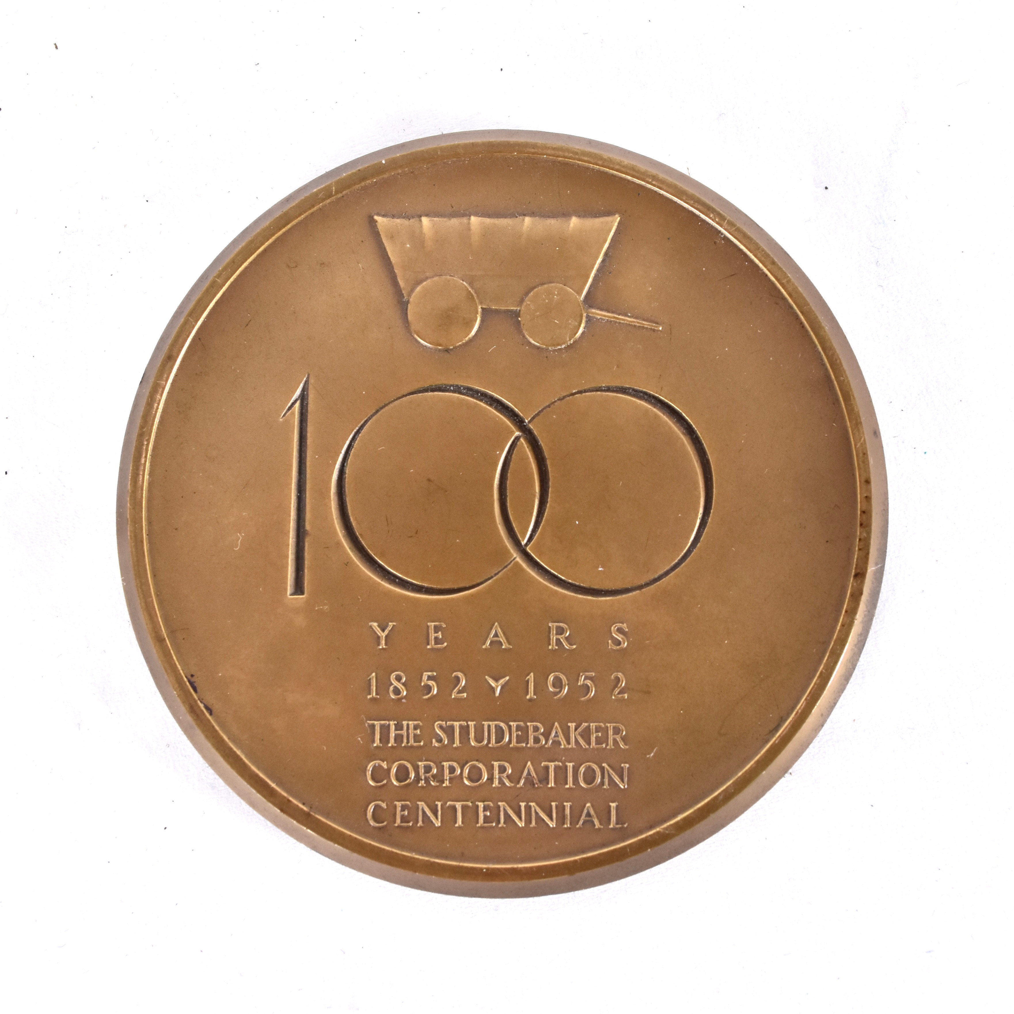 MEDALJ, brons, Studebaker 100 år.
