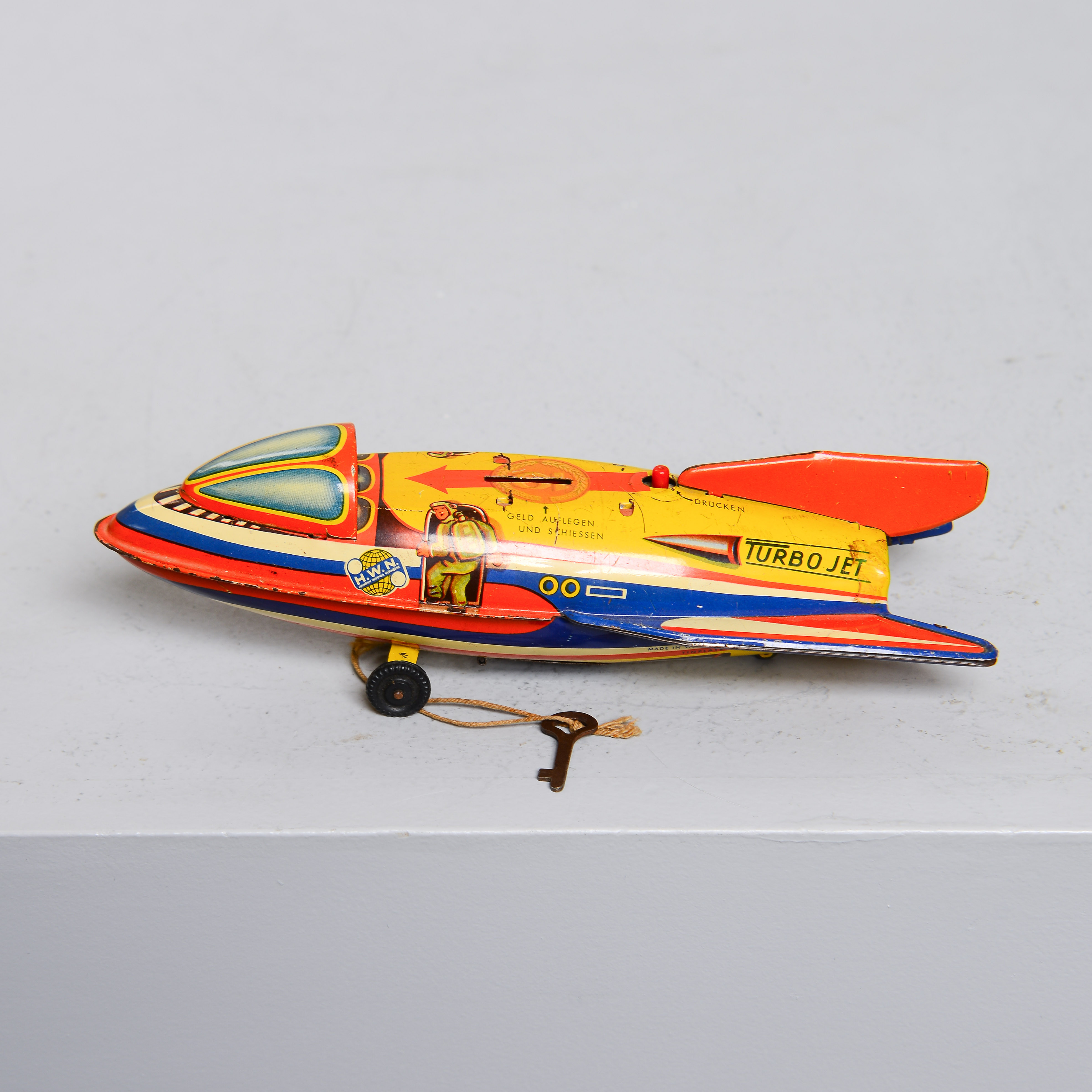 PLÅTLEKSAK, "Turbo Jet Money Bank", HWN (Heinrich Wimmer Nurnberg), Västtyskland, 1960-tal.