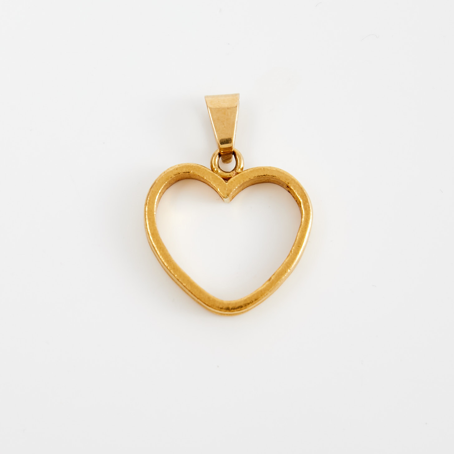 HÄNGE, 23 k guld, i form av sammansatta dubbla hjärtan, Joh. Petterssons Eftr Juvelerar Ab, Stockholm, 1935/1936.