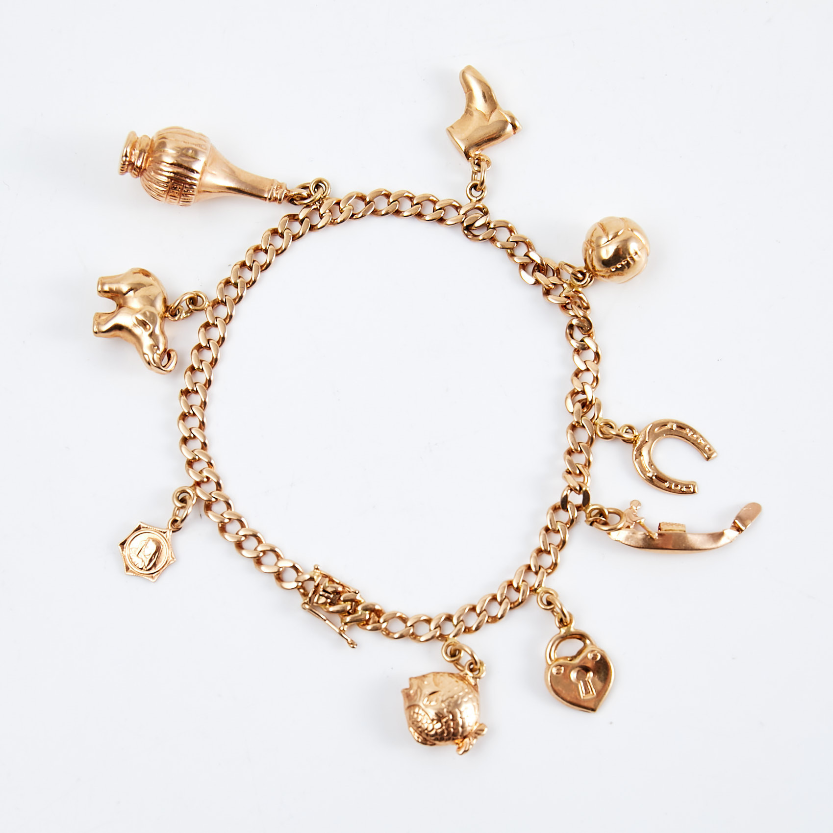 ARMBAND, 18 k guld, pansarlänk, med totalt 9 berlocker, Robert Eriksson, 1919.