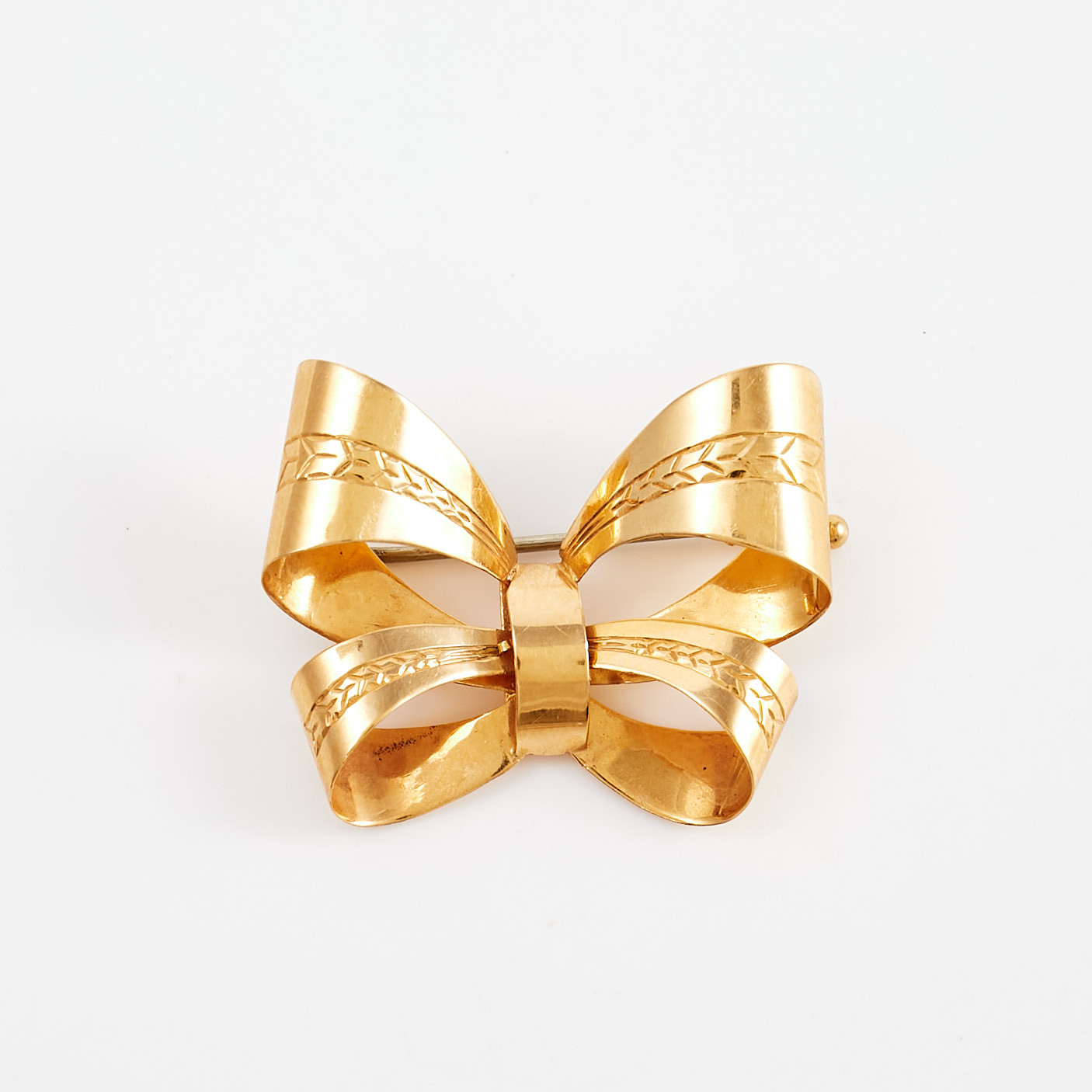 BROSCH, 18 k guld, i form av rosett, Stigbert, Heribert Engelbert AB, Stockholm, 1946.