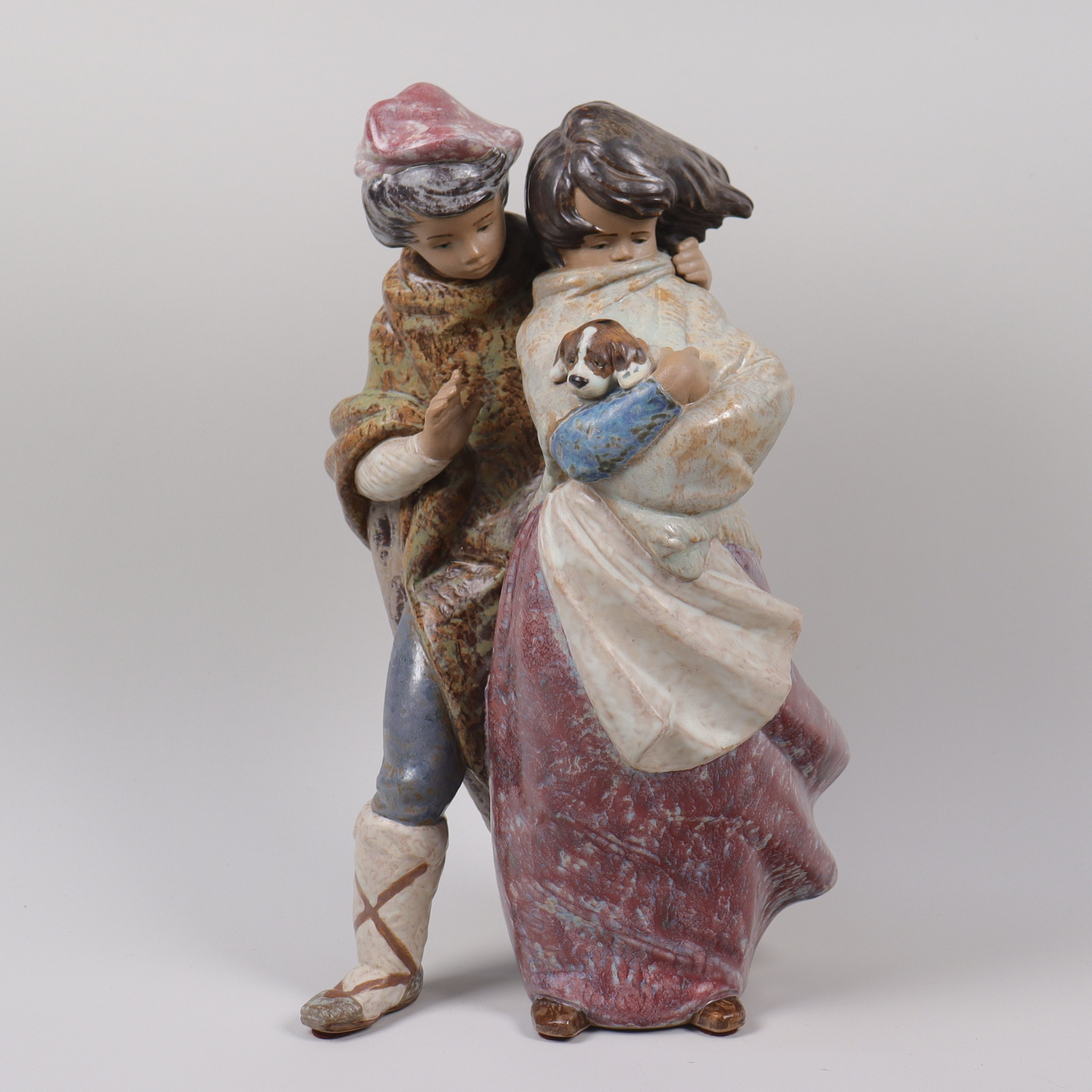 JUAN HUERTA. figurin, Lladro, Spanien "Facing The Wind".