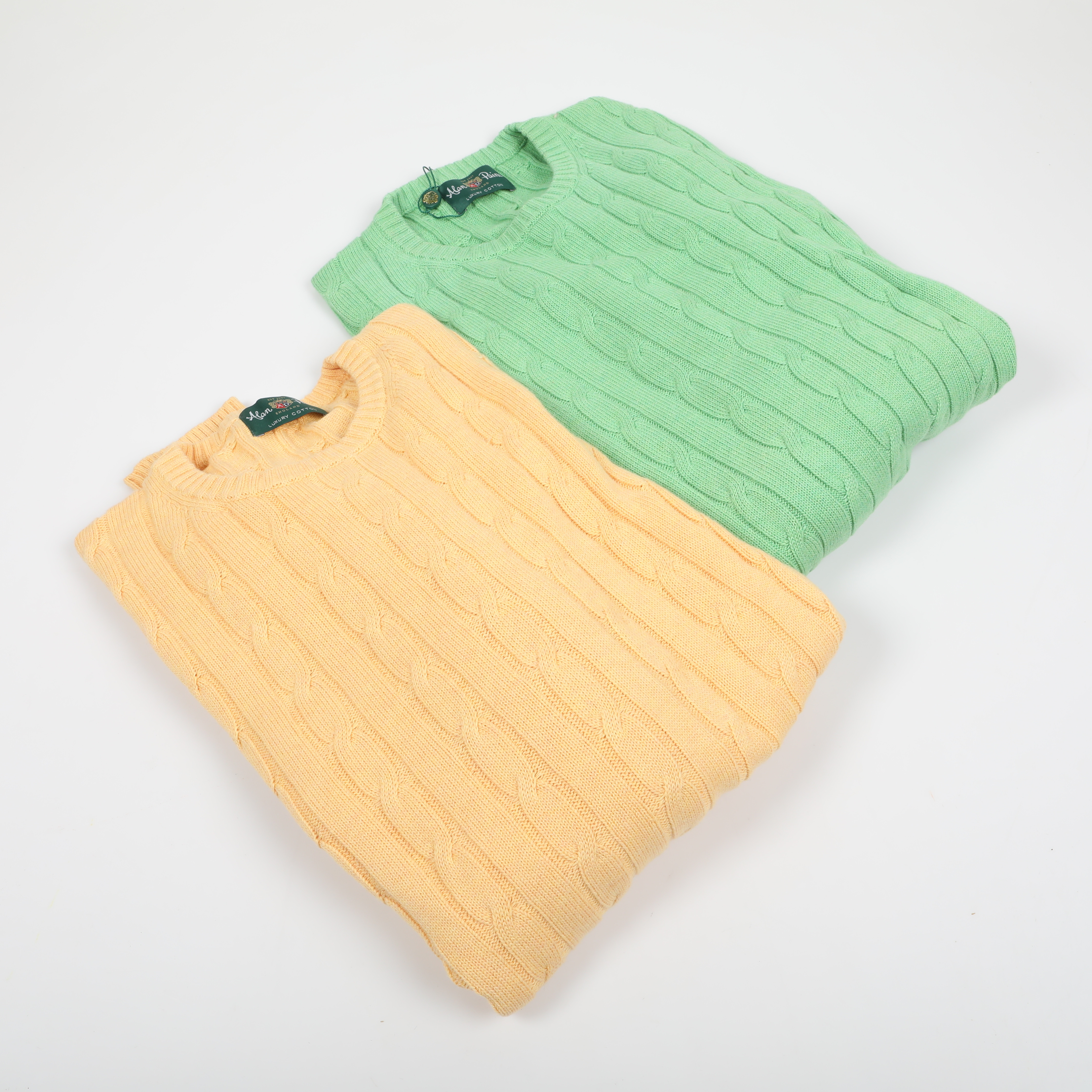 TRÖJOR, 2 stycken, kabelstickade, bomull/cashmere, Alan Paine, England.