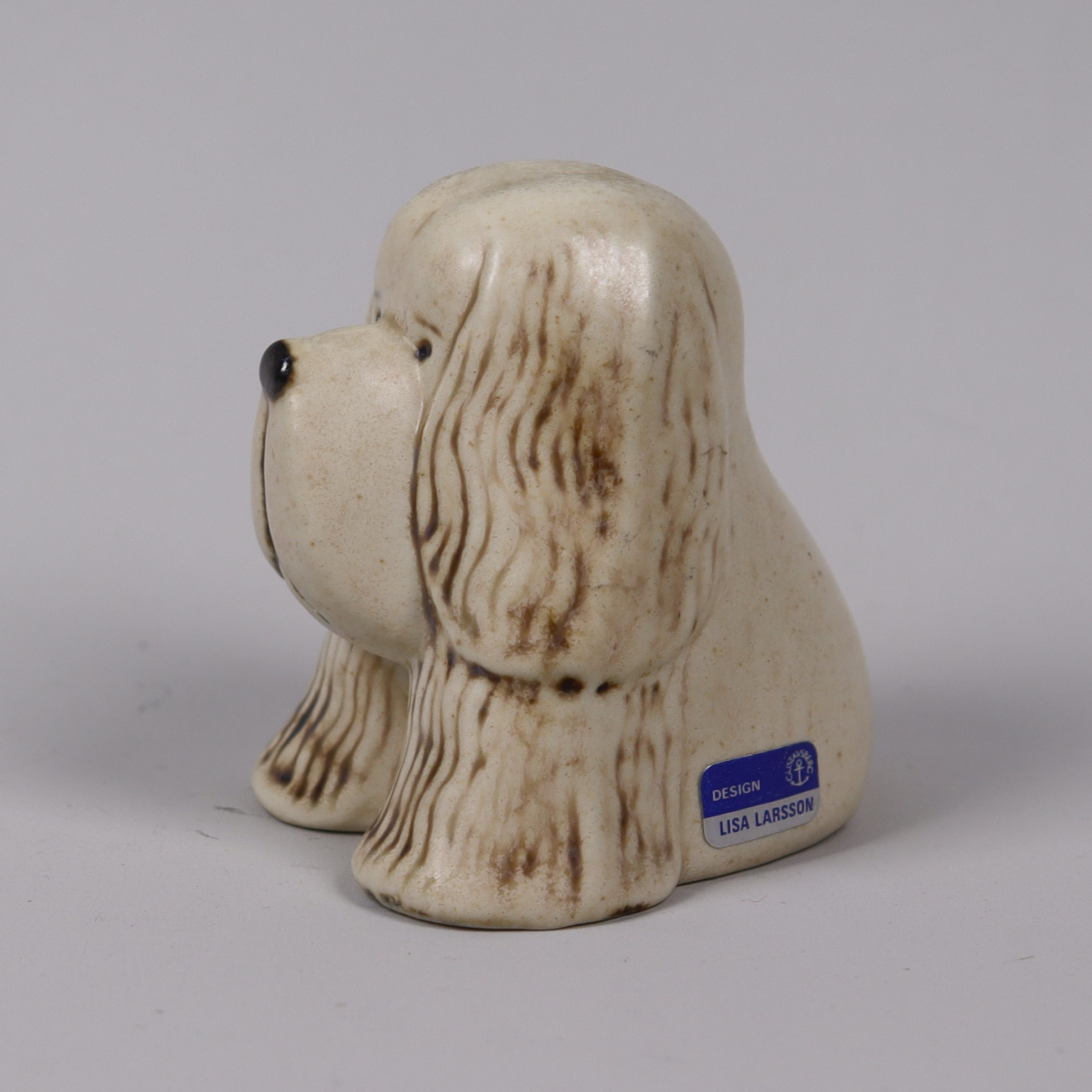 LISA LARSON. Gustavsberg, "Spaniel" ur serien "Kennel", figurin i stengods.