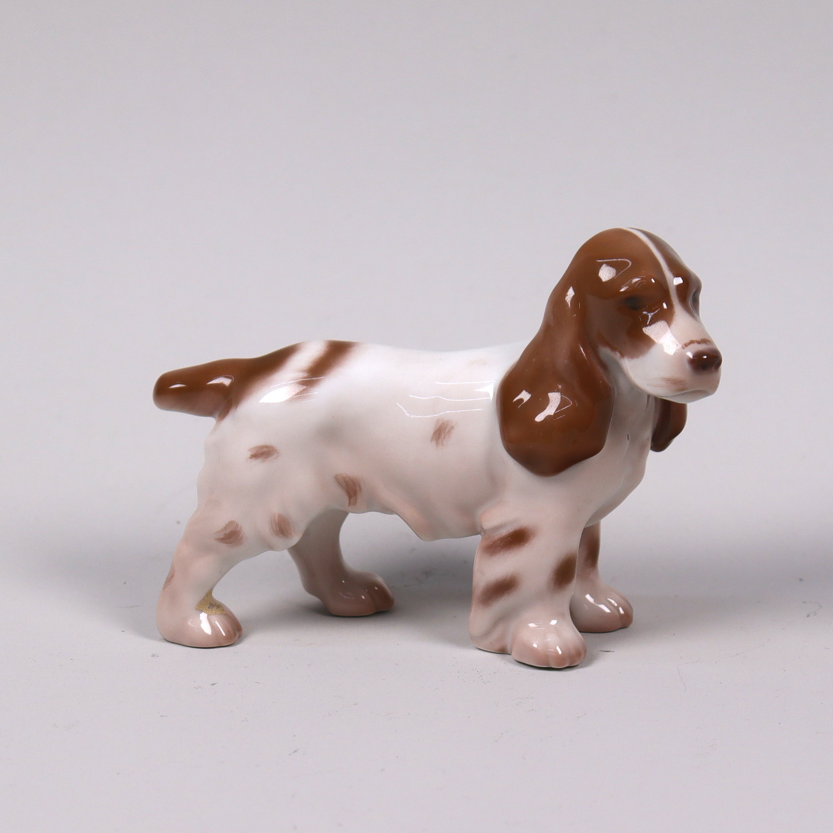 SVEND JESPERSEN. för Bing & Gröndahl. figurin #2172, cockerspaniel i porslin.