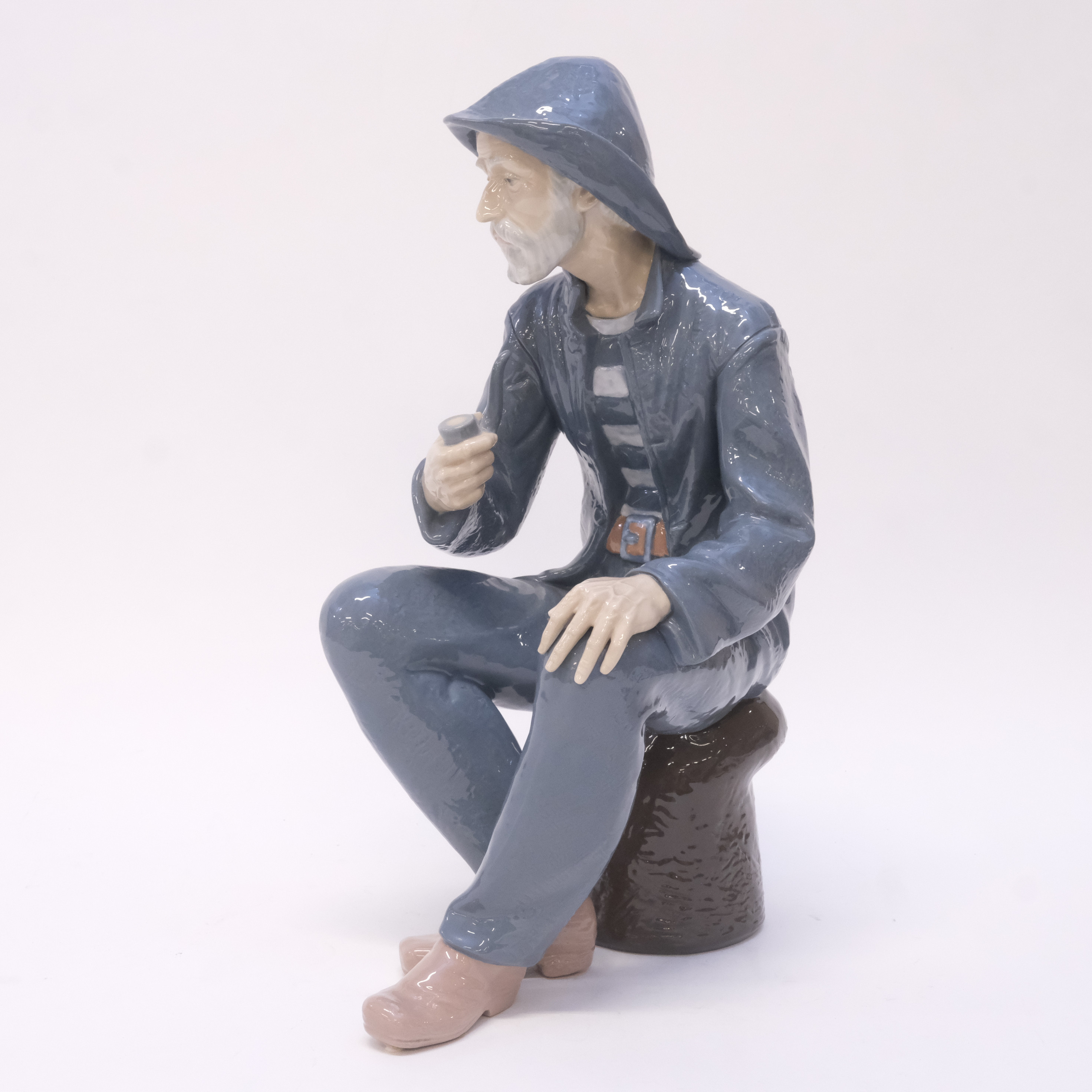 FIGURIN, FISKARE MED PIPA, NAO.
