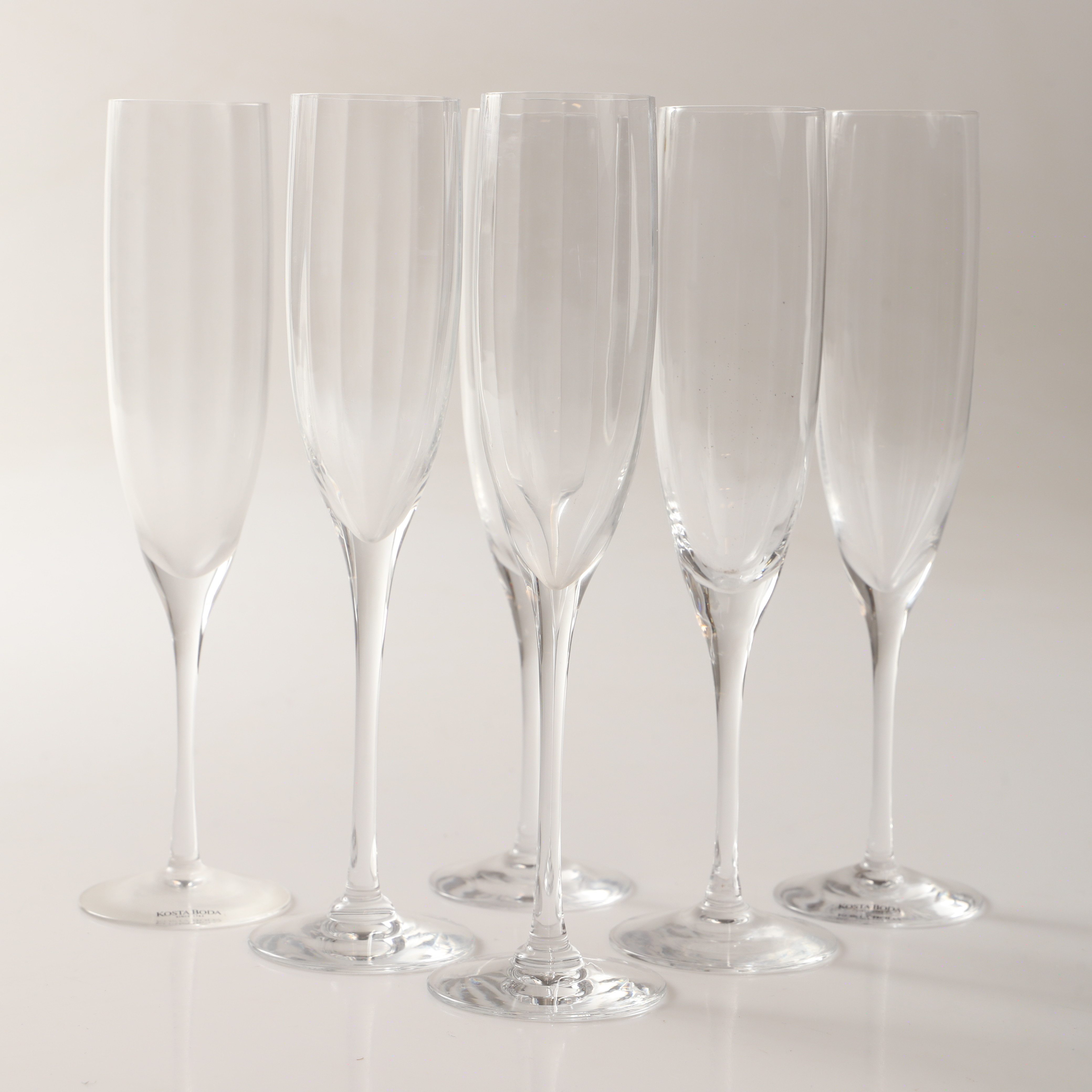 GUNNAR CYRÉN. Champagneglas, 6 stycken, "Optica Symphony", Orrefors samt Kosta Boda.