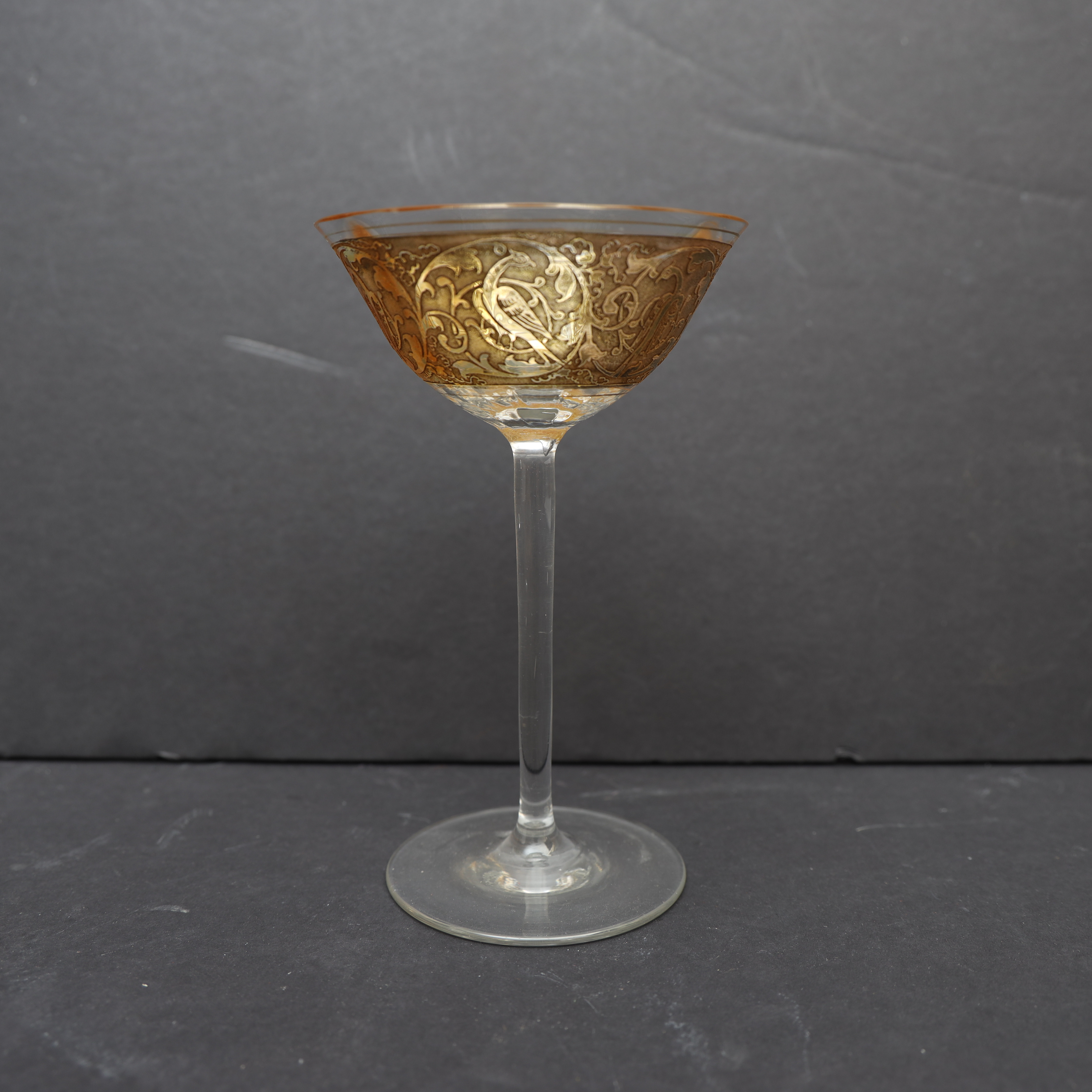 CHAMPAGNESKÅL, 1900-talets första hälft, förgylld dekor i relief av fåglar.