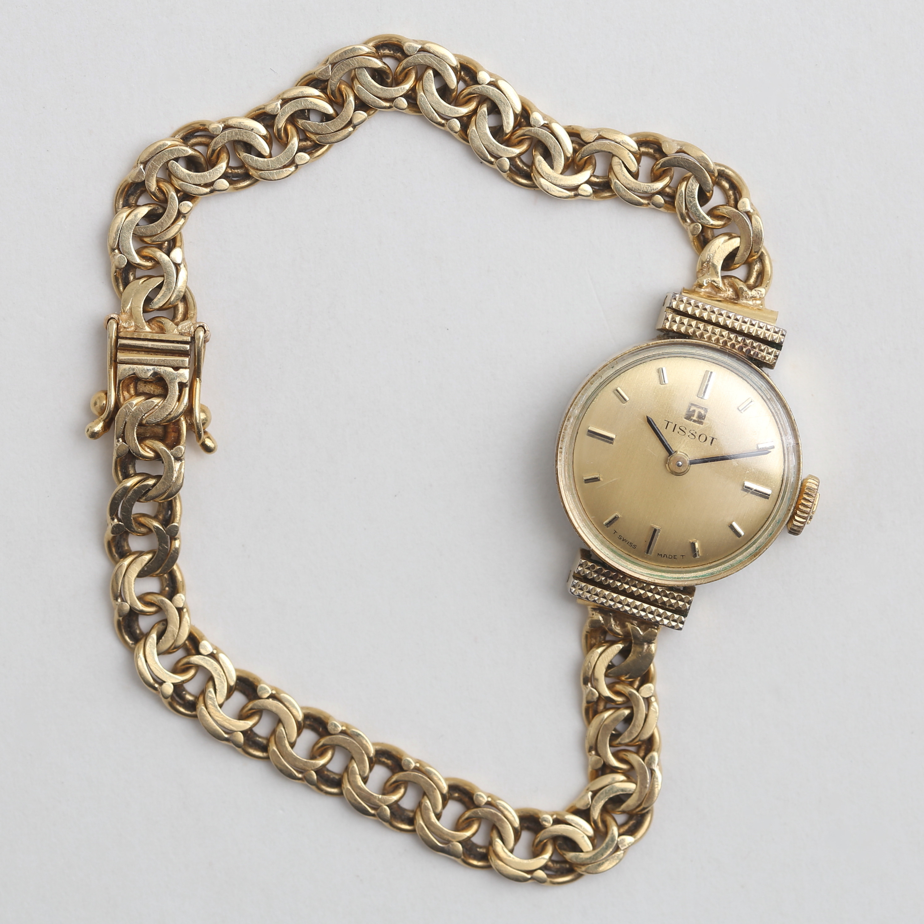 TISSOT, damarmbandsur, manuellt, bismarcklänk i 18k guld.