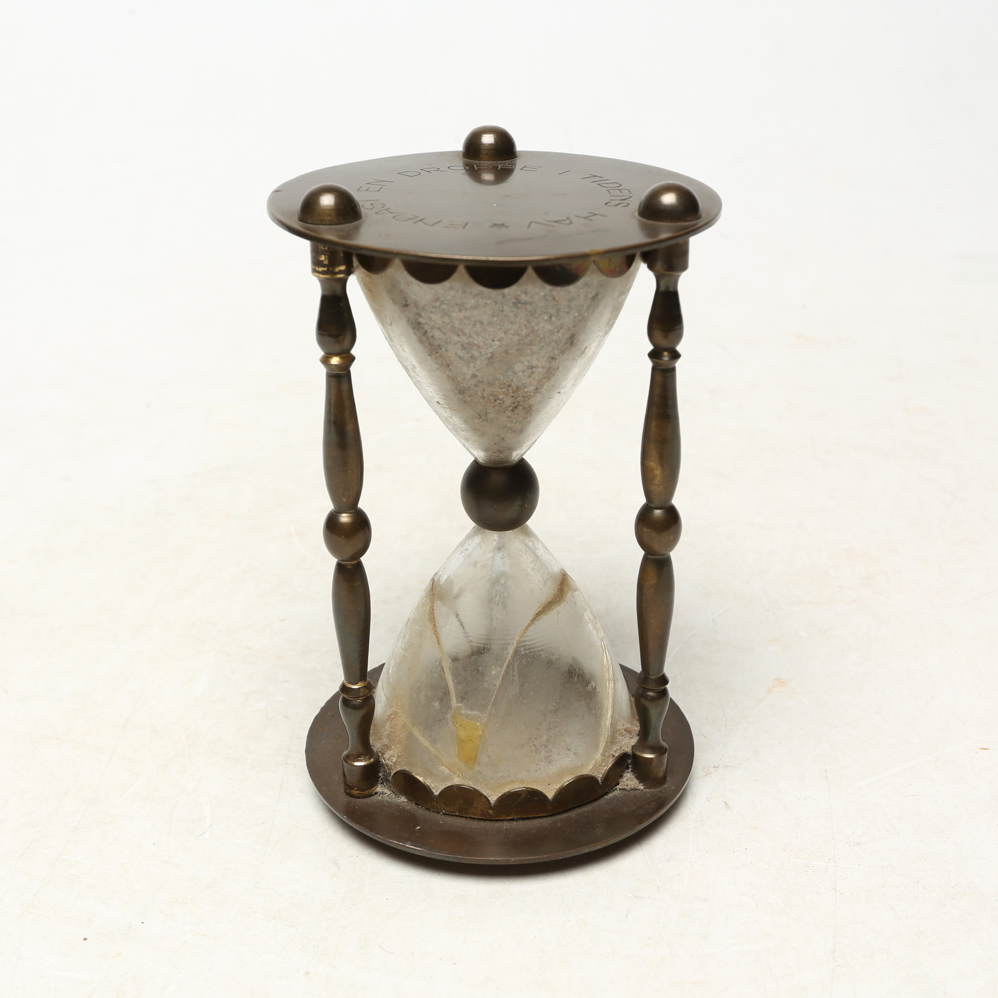 TIMGLAS, metall/glas "ENDAST EN DROPPE I TIDENS HAV" 1900-tal.