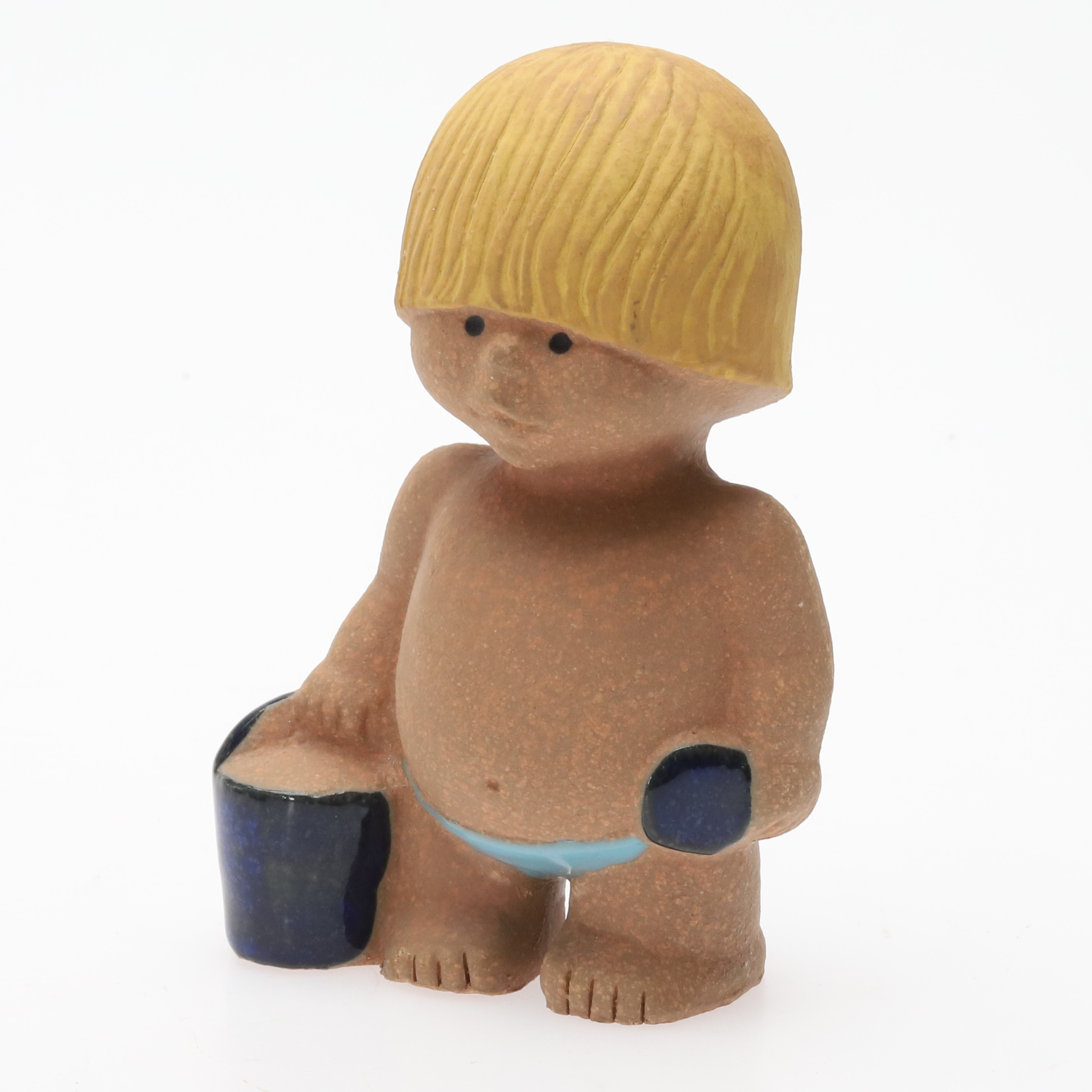 LISA LARSON. FIGURIN, keramik, "Väst", Alla Världens Barn, Gustavsberg, formgiven 1974.