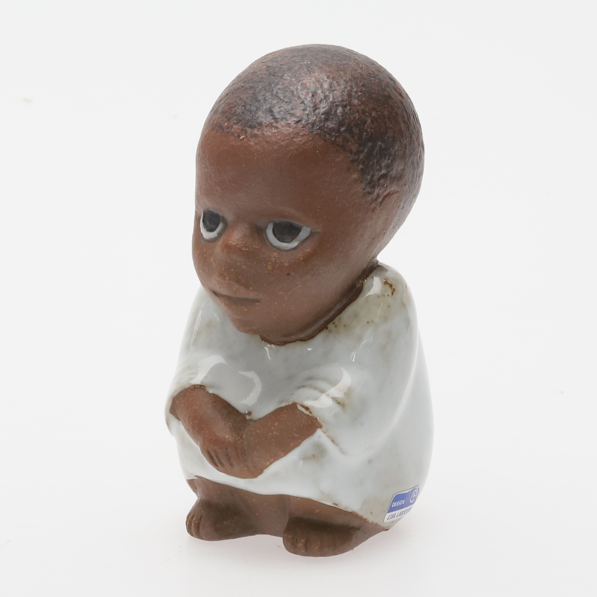 LISA LARSON. FIGURIN, keramik, "Syd", Alla Världens Barn, Gustavsberg, formgiven 1974.